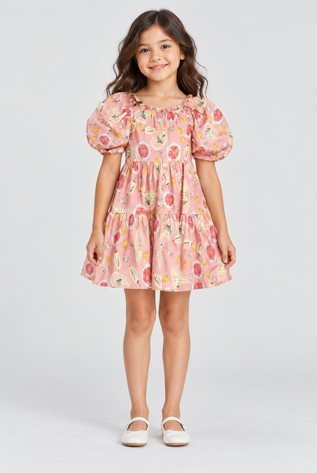 Girls’ blush-pink fruit-print tiered dress, full front on child model Lina