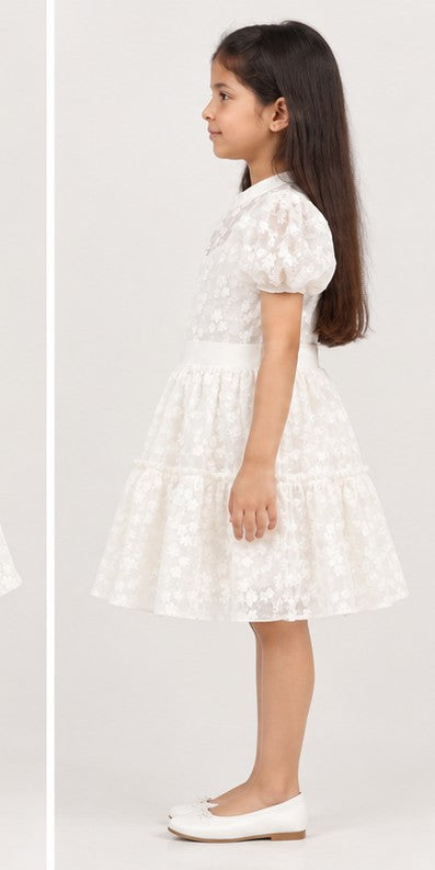 Girl model left view wearing Gingersnaps white embroidered tiered dress