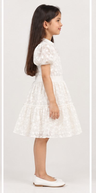 Girl model right view wearing Gingersnaps white embroidered tiered dress