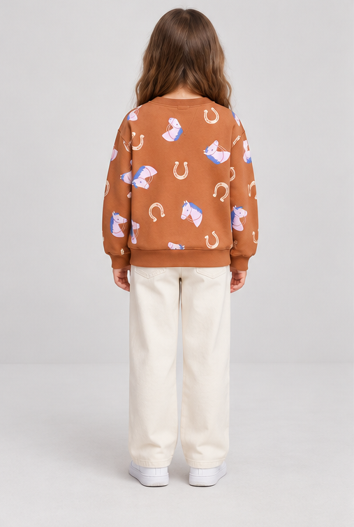 Child model wearing horse-print terracotta sweatshirt, back view