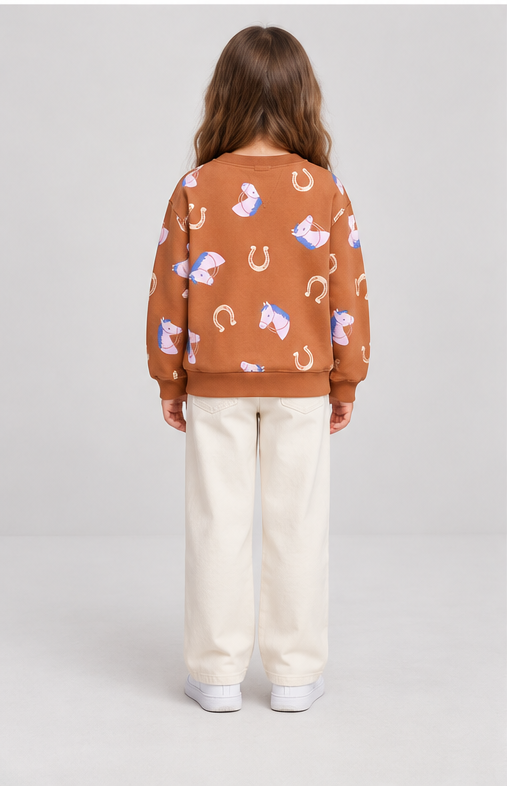 Child model wearing horse-print terracotta sweatshirt, back view