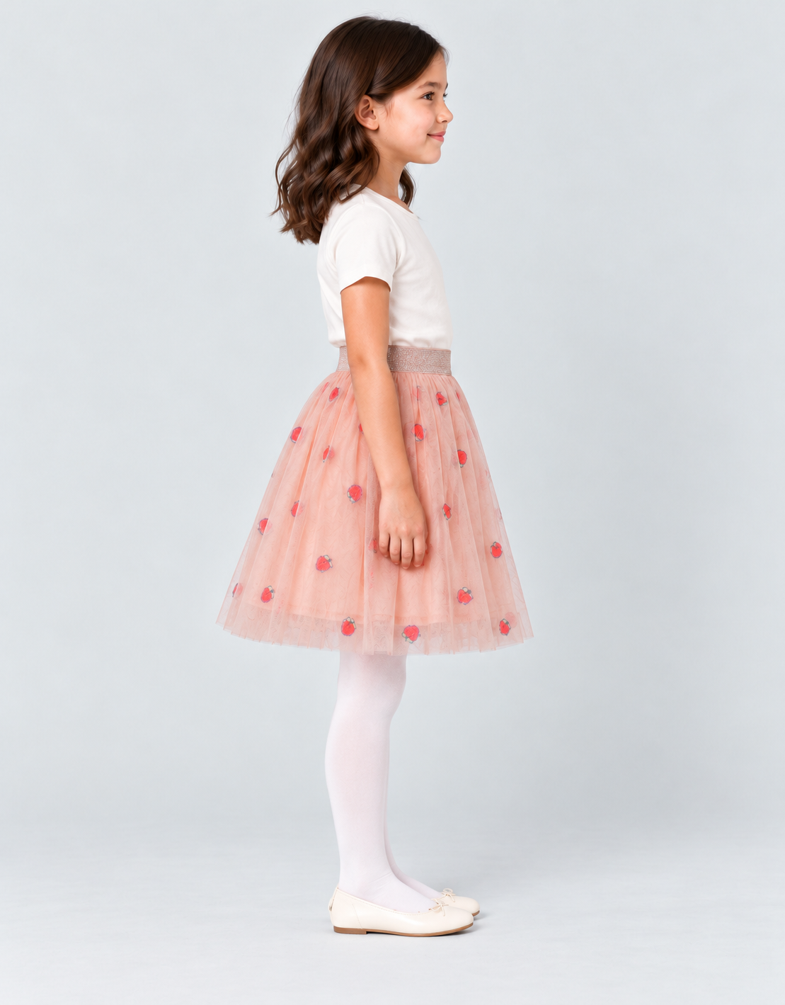 Girls peach strawberry tulle skirt, side view