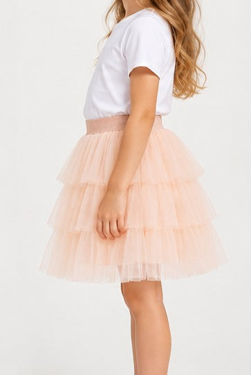 Left side view of Gingersnaps girls peach tiered tulle skirt