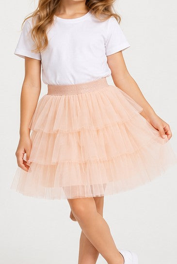 Lifestyle view of Gingersnaps girls peach tiered tulle skirt