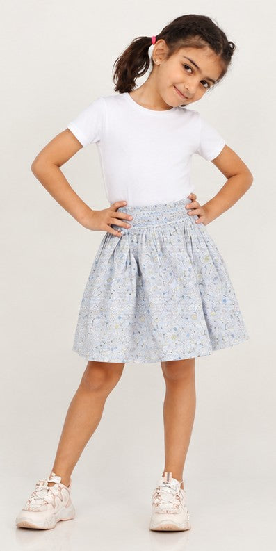 Girls model front view wearing Gingersnaps pale blue floral skirt