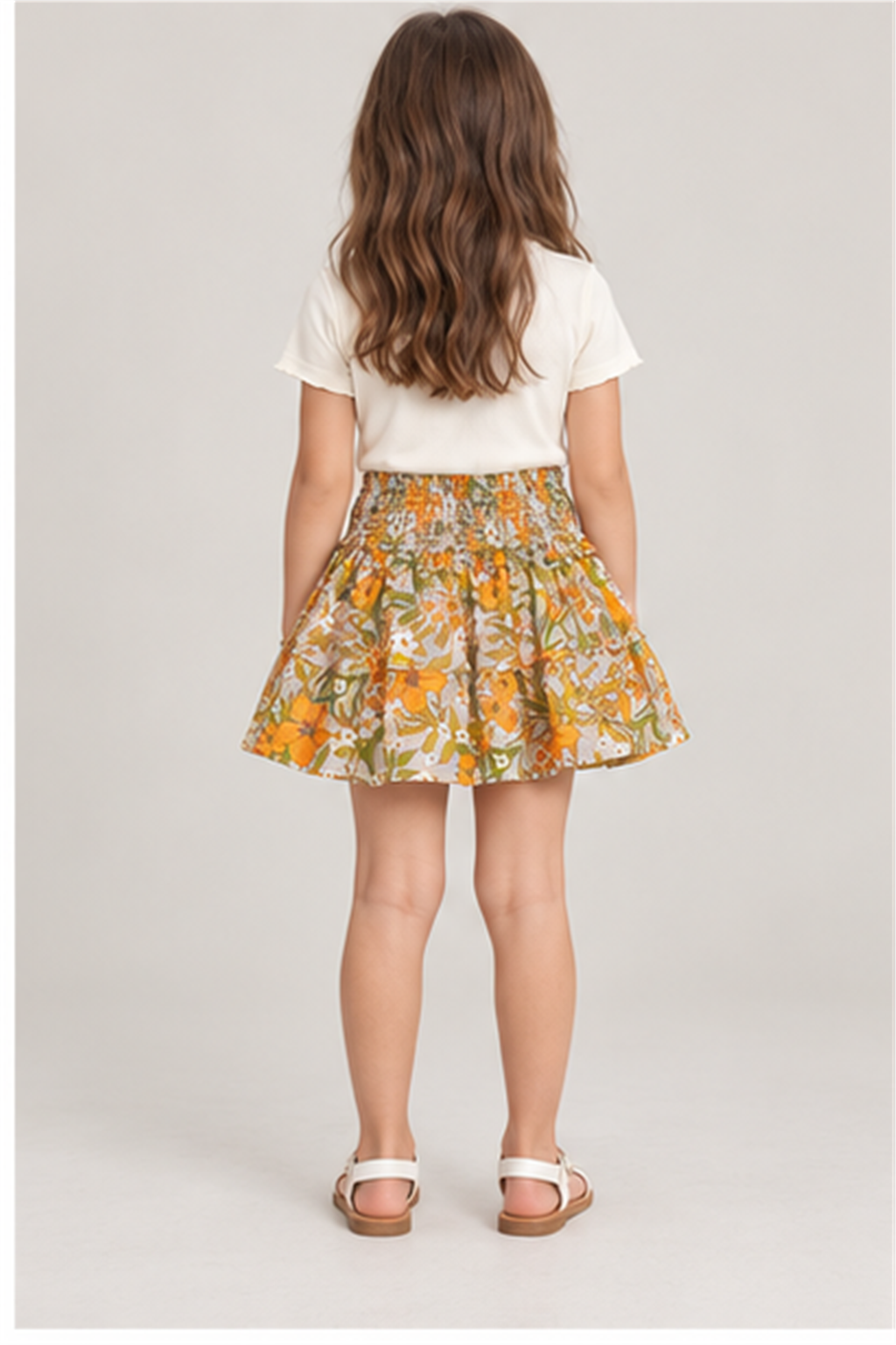 Girls' floral skirt on child model, back view