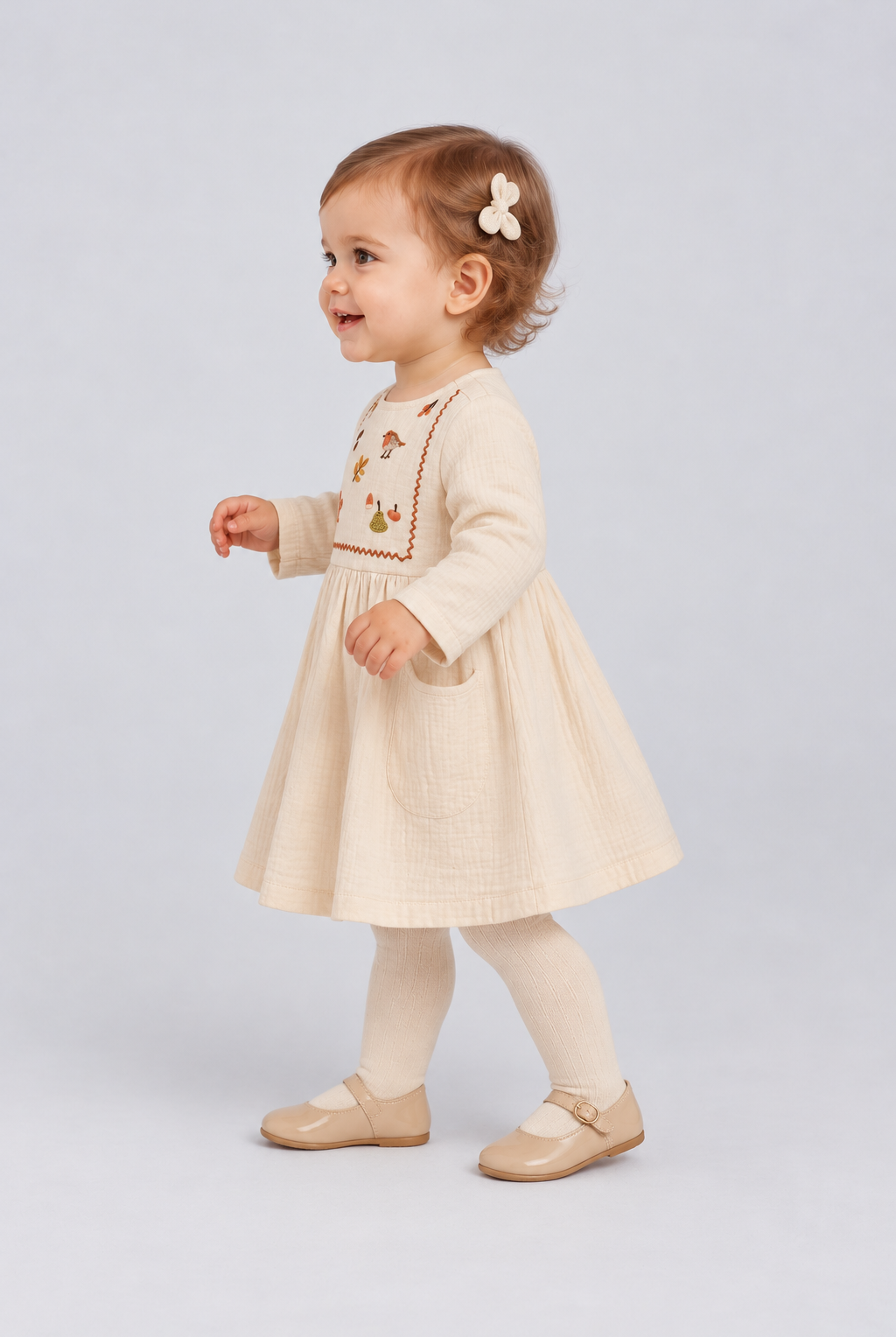 IGDR0904 ivory embroidered infant dress, left model view