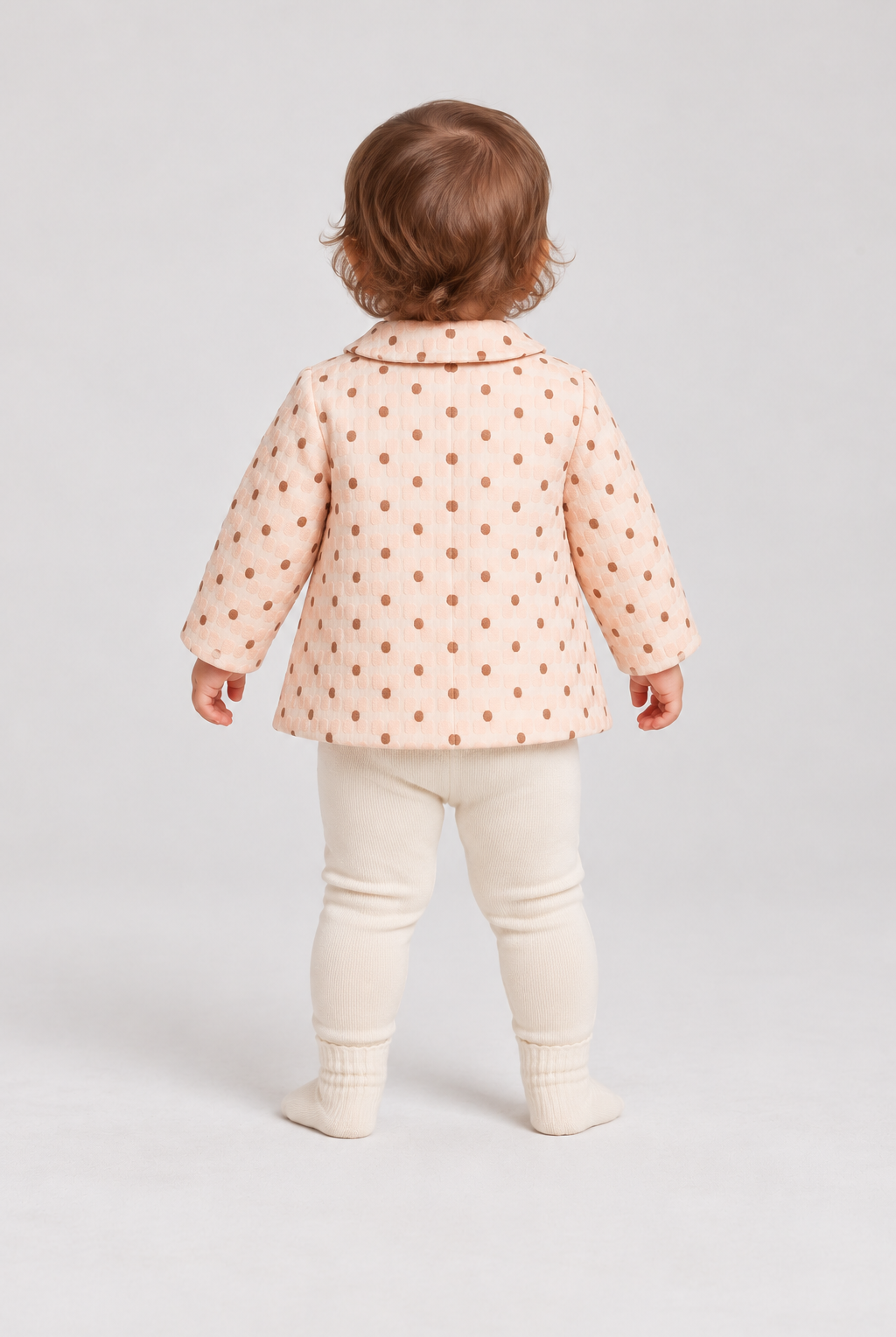 Back baby girl model view of Gingersnaps dotted jacket