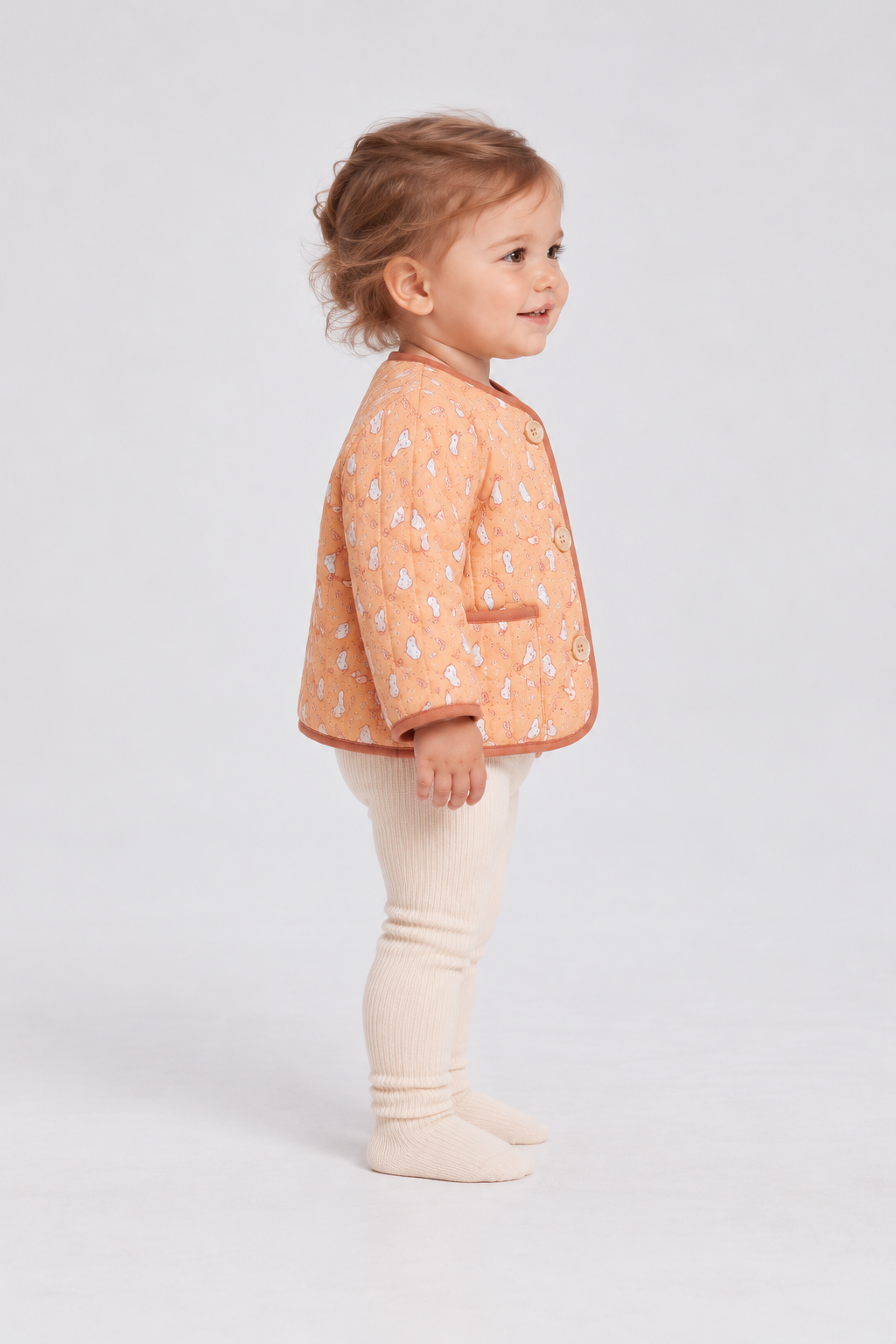 Right side baby model view of Gingersnaps printed infant jacket