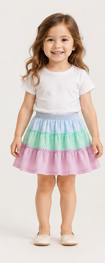 Girls toddler model front view wearing Gingersnaps pastel tiered skirt