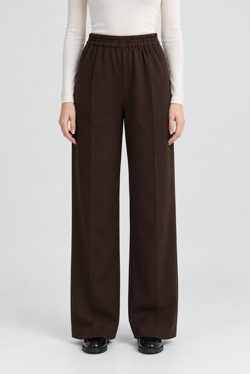 Garment-focused front view - brown long pants - Andrea