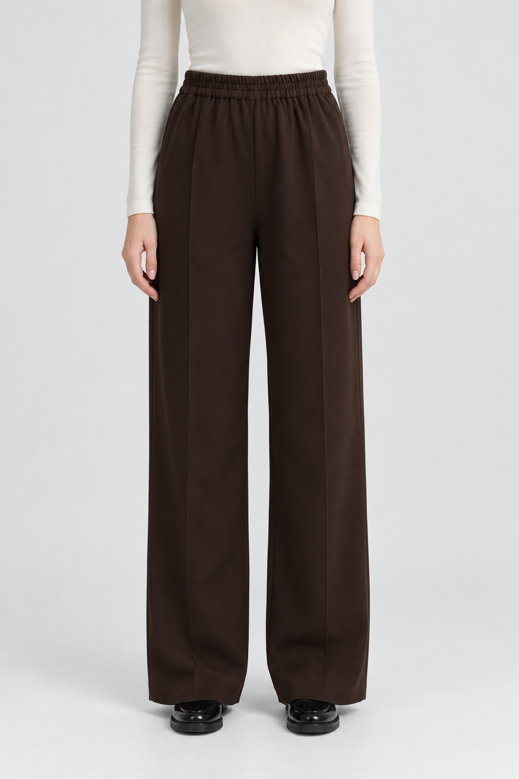 Garment-focused front view - brown long pants - Andrea