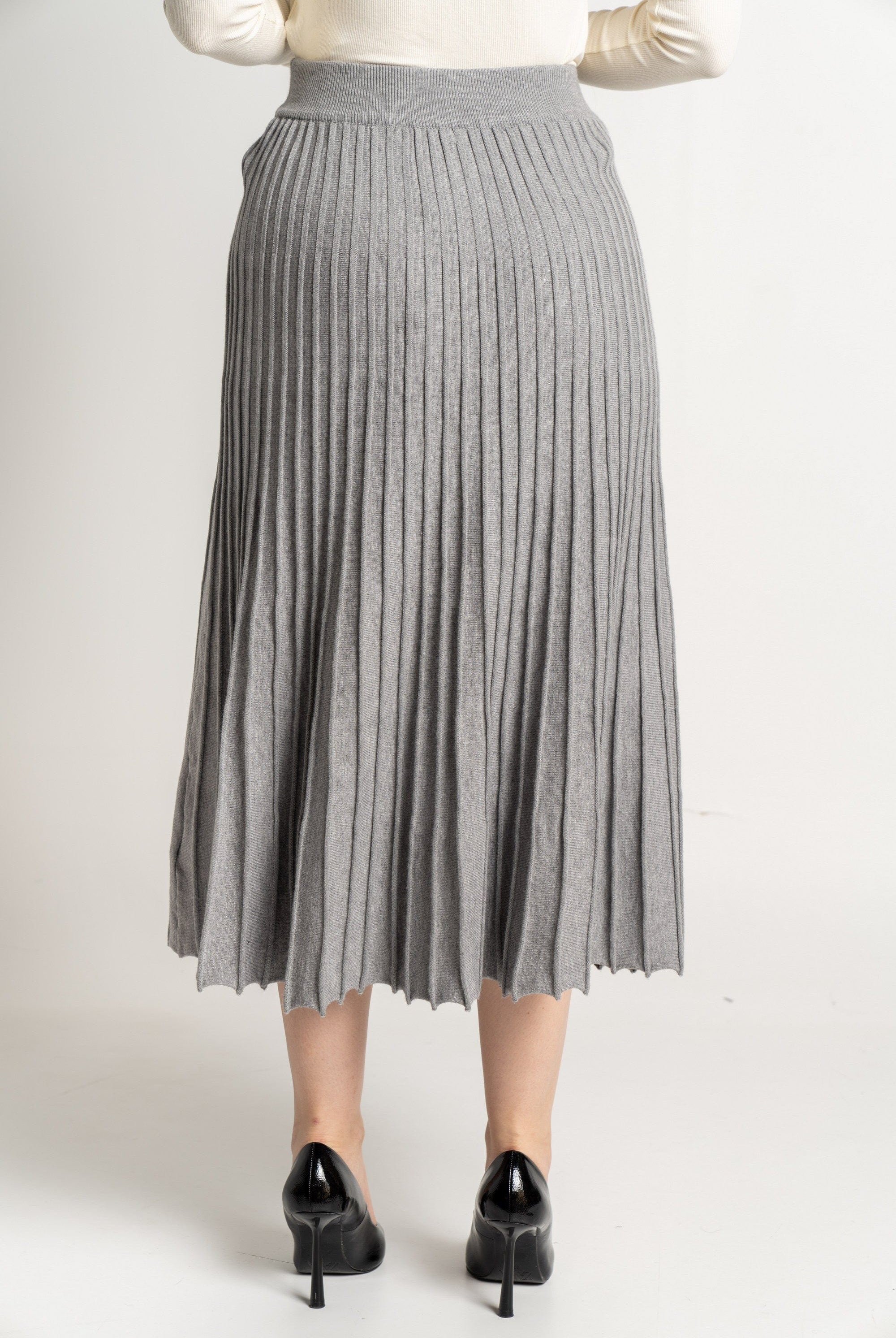 ميكا تنورة ميدى سادة مضلعة