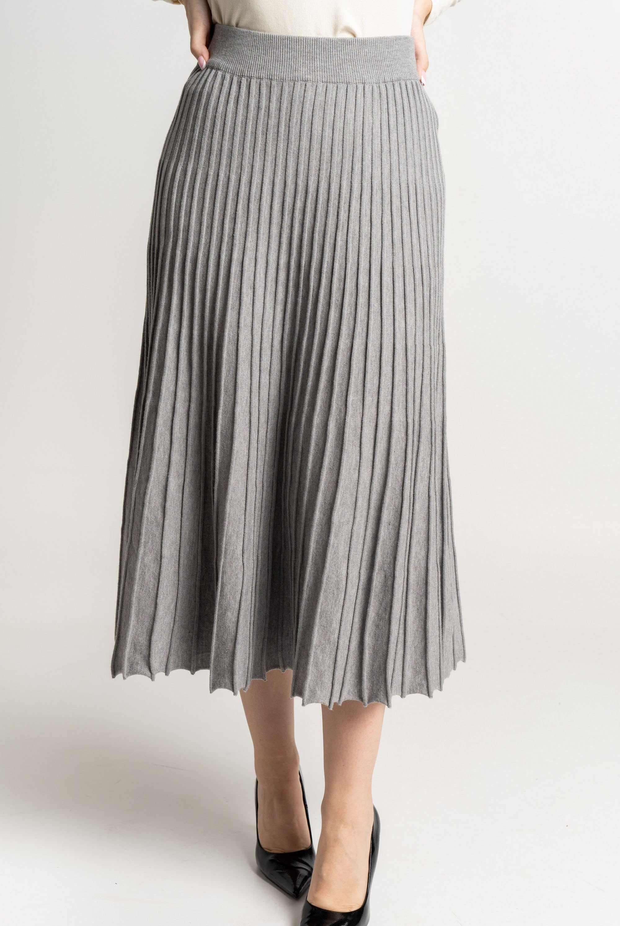 ميكا تنورة ميدى سادة مضلعة