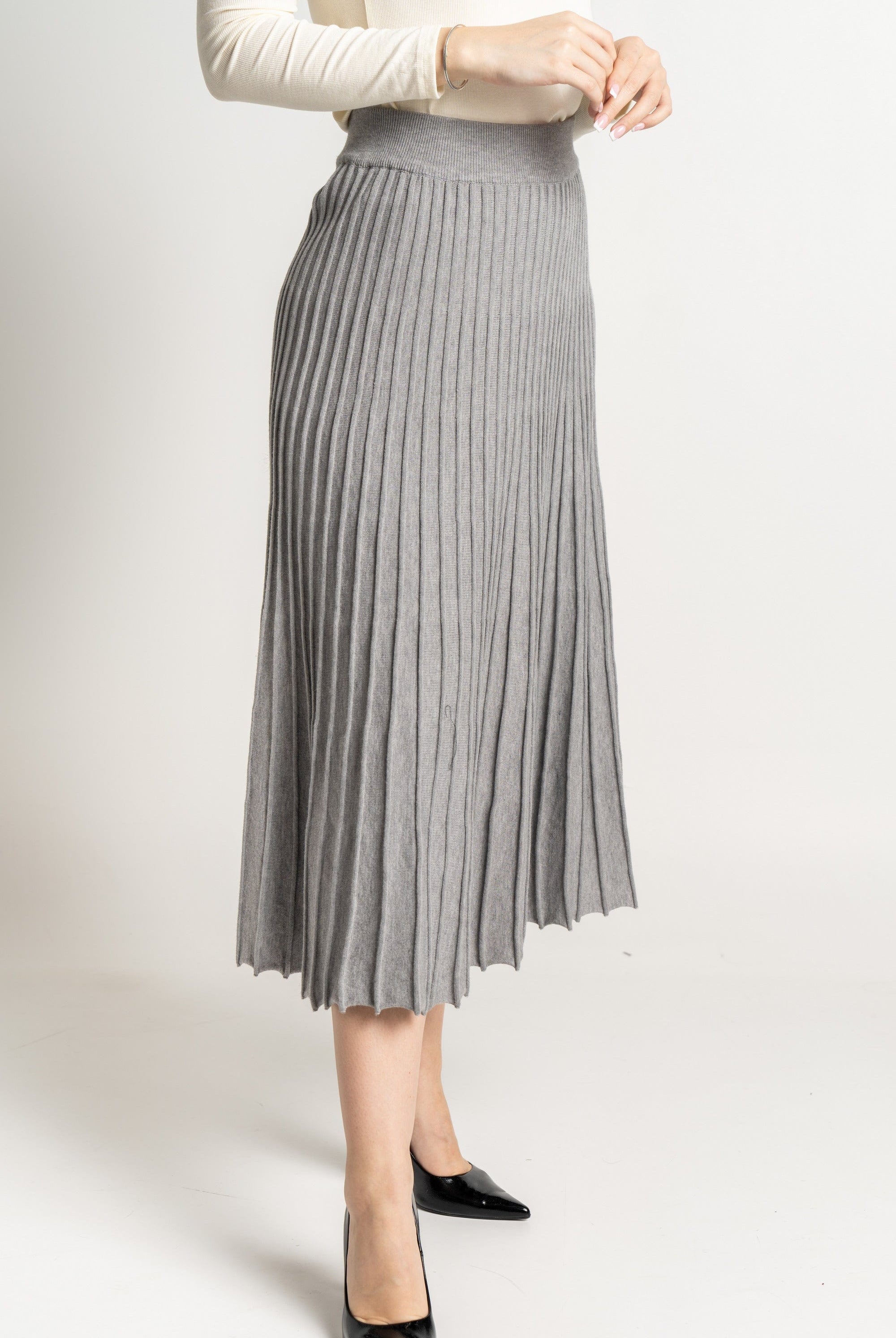 ميكا تنورة ميدى سادة مضلعة