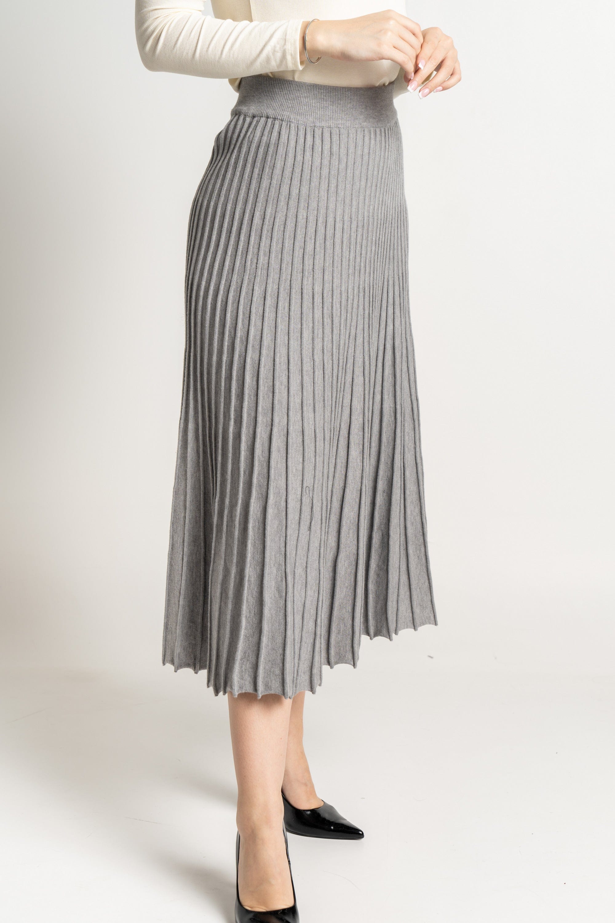 ميكا تنورة ميدى سادة مضلعة