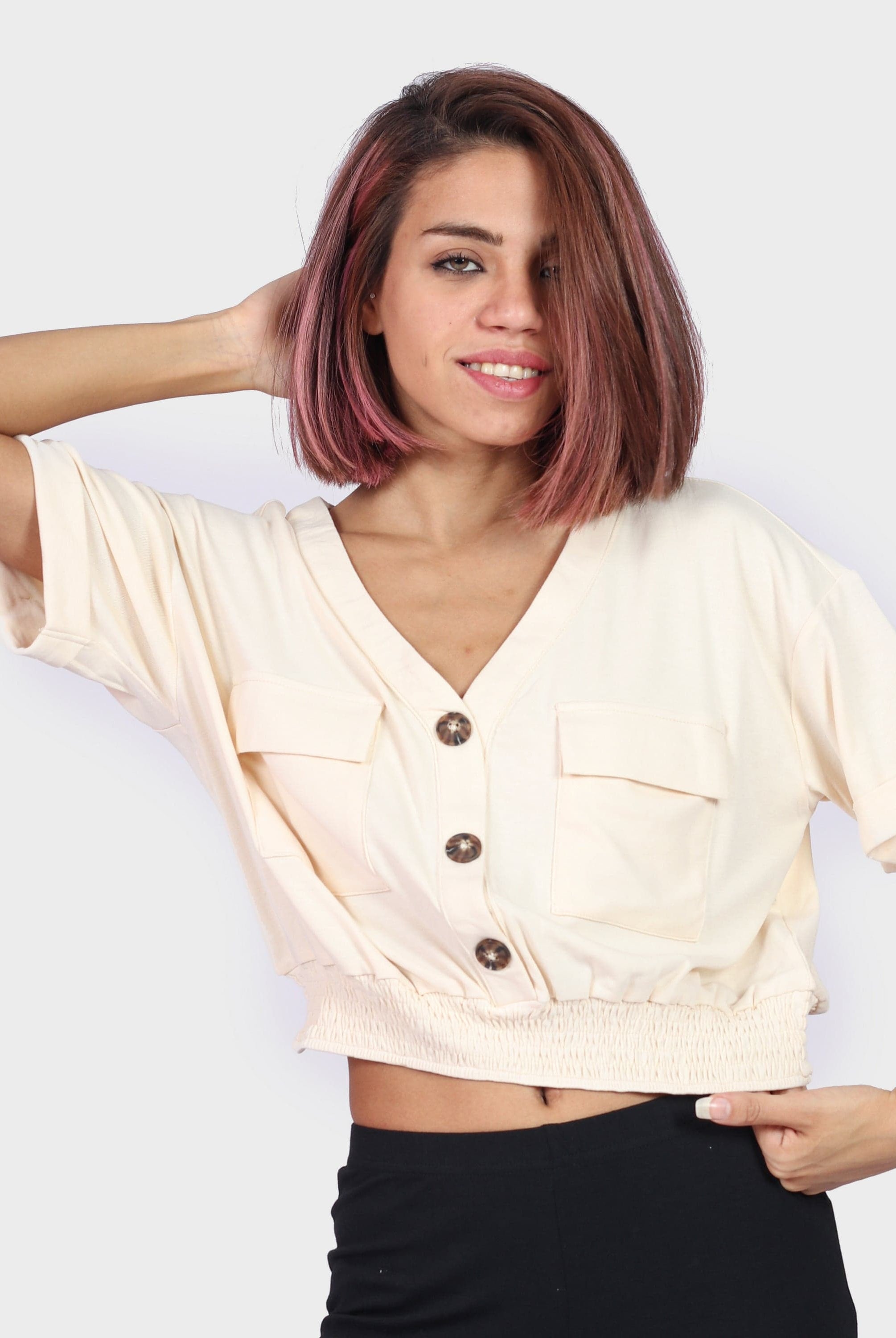 كيتشن بلوزة واسعة بأزرار أمامية وجيب يد نسائي