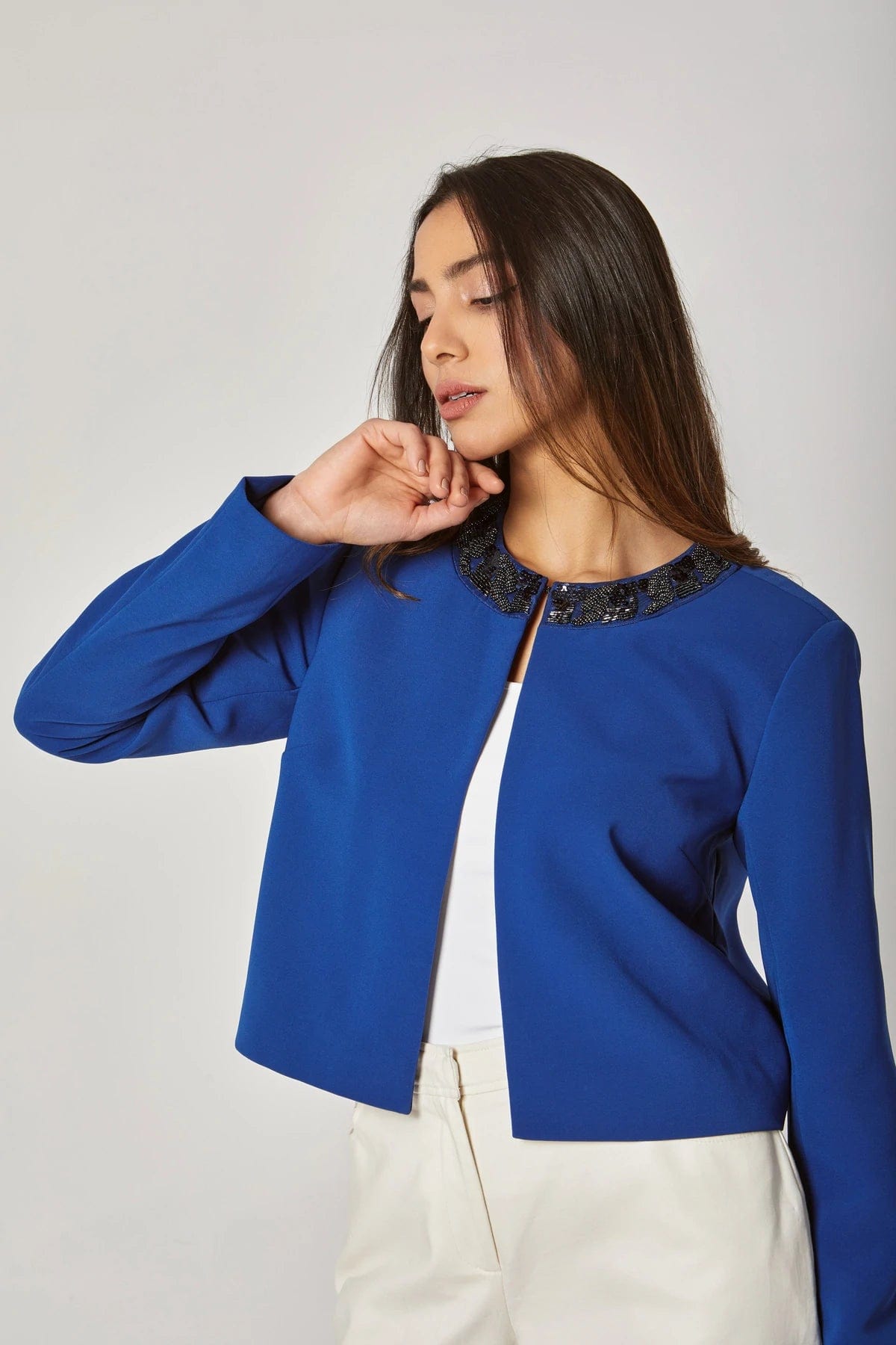 داليدرس جاكيت قصير سادة مزين بالستراس من أعلى نسائي أزرق