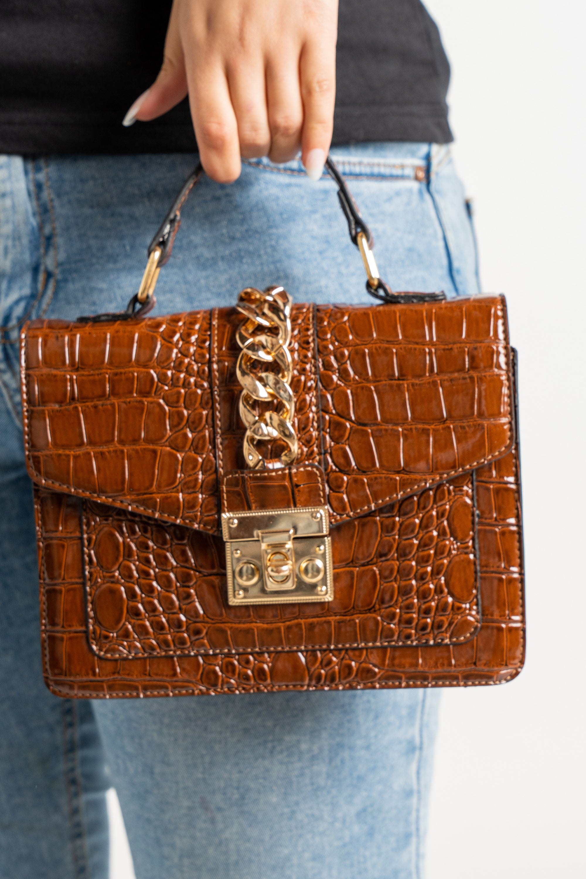 داليدرس حقيبة يد سادة مزينة بحلقات معدنية