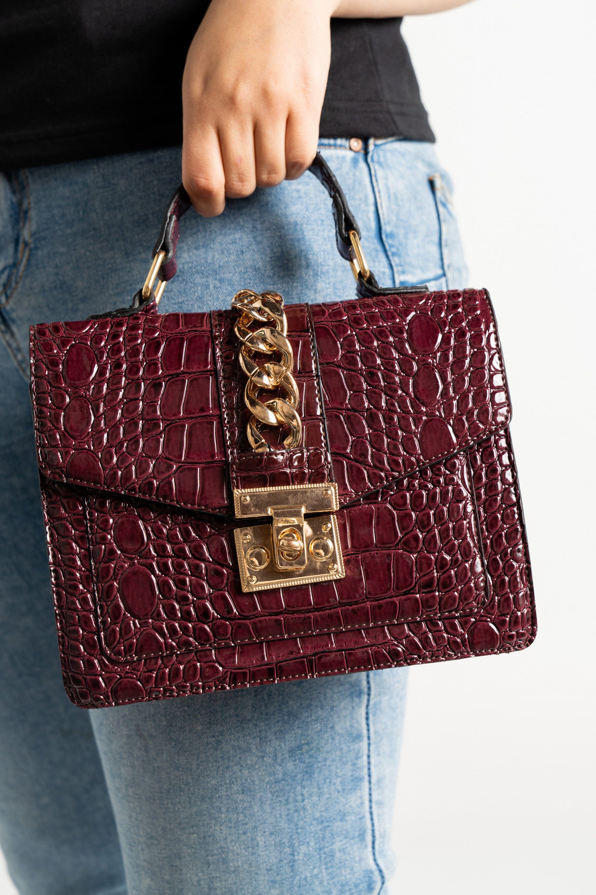 داليدرس حقيبة يد سادة مزينة بحلقات معدنية