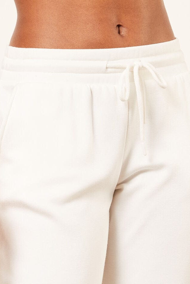 اتام سويت بانتس رياضي طويل واسع مع رباط على الخصر نسائي بيج فاتح