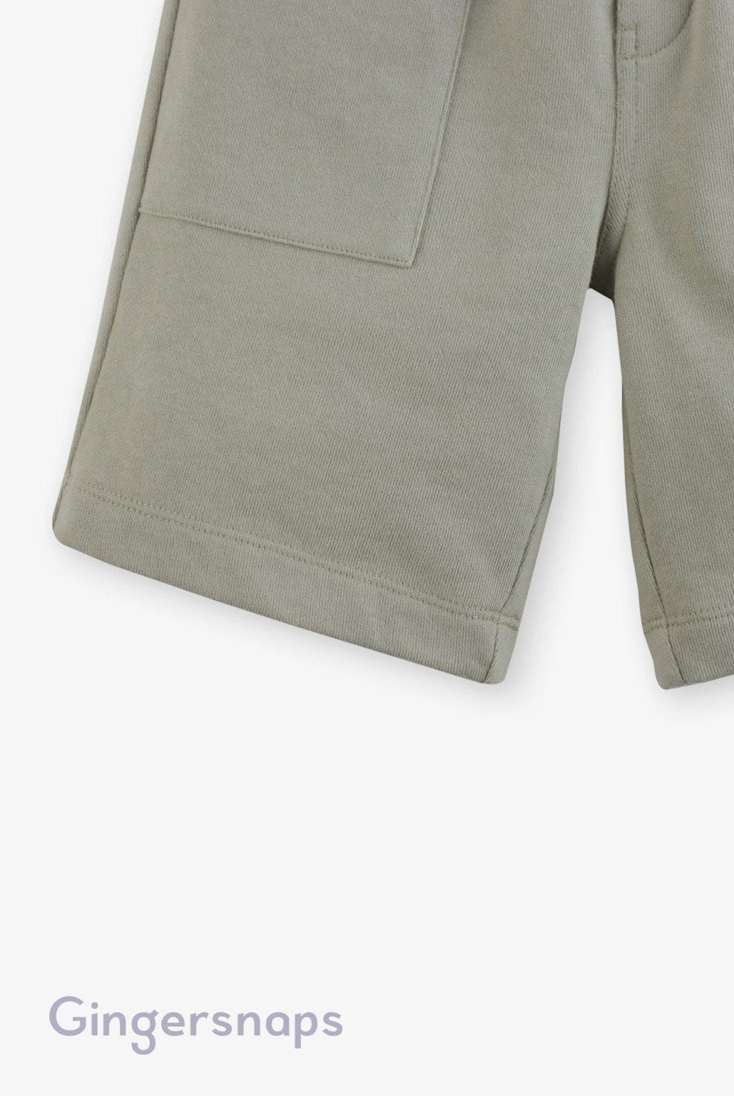 جينجرسنابس شورت أولادي بطبعة على الجانب وفيونكة أخضر