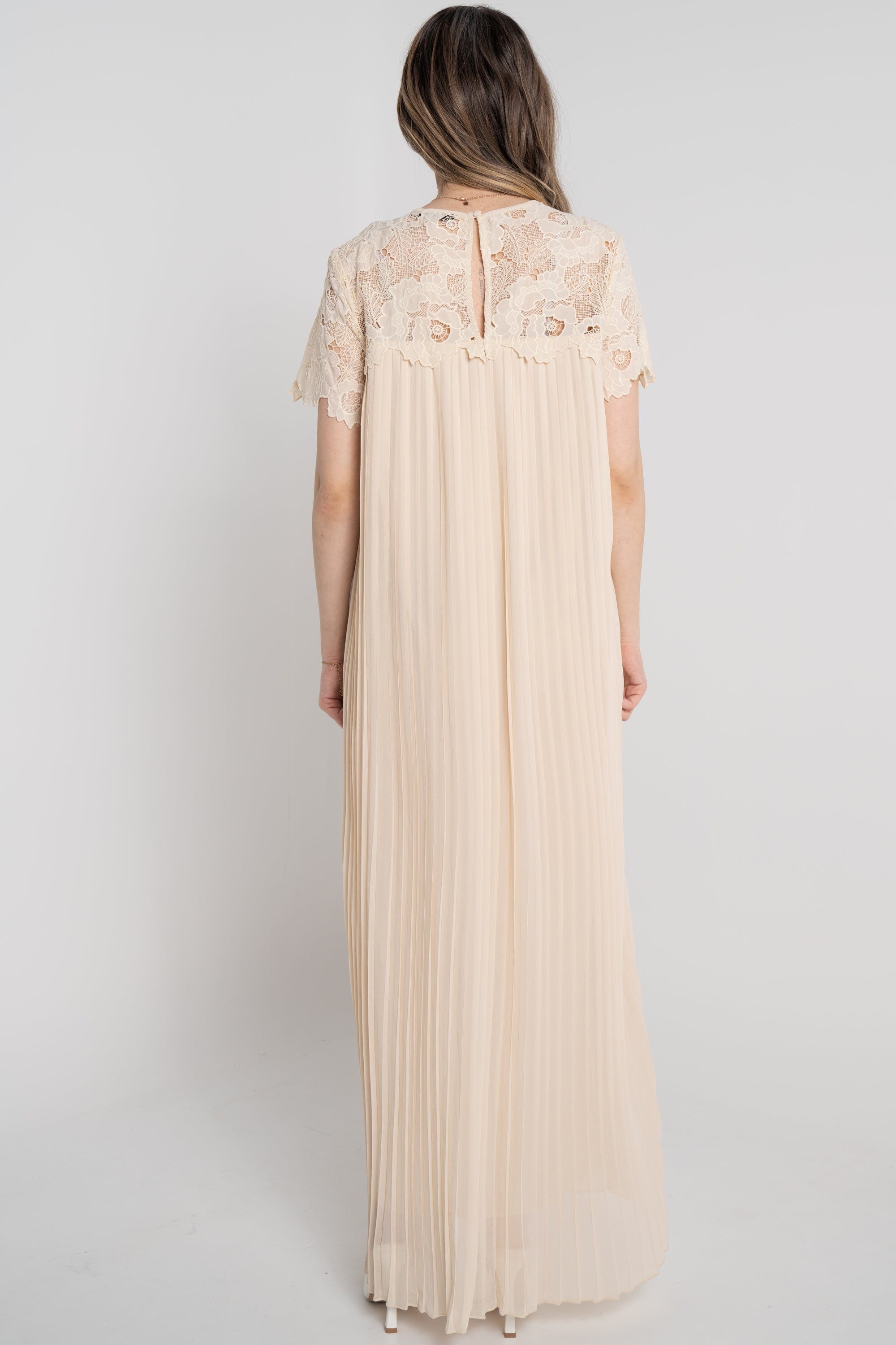 نتشي فستان طويل سادة بليسيه نص كم جوبير