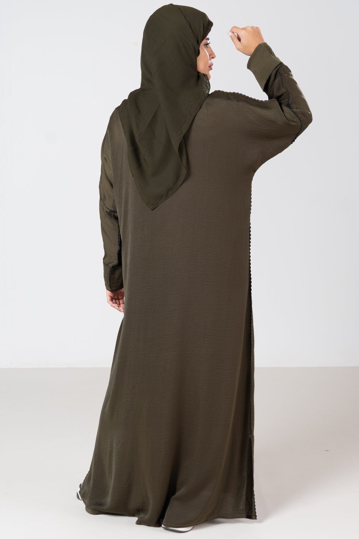 جوهرة عباية حرير مغسولسادة واسع كم طويل أخضر غامق