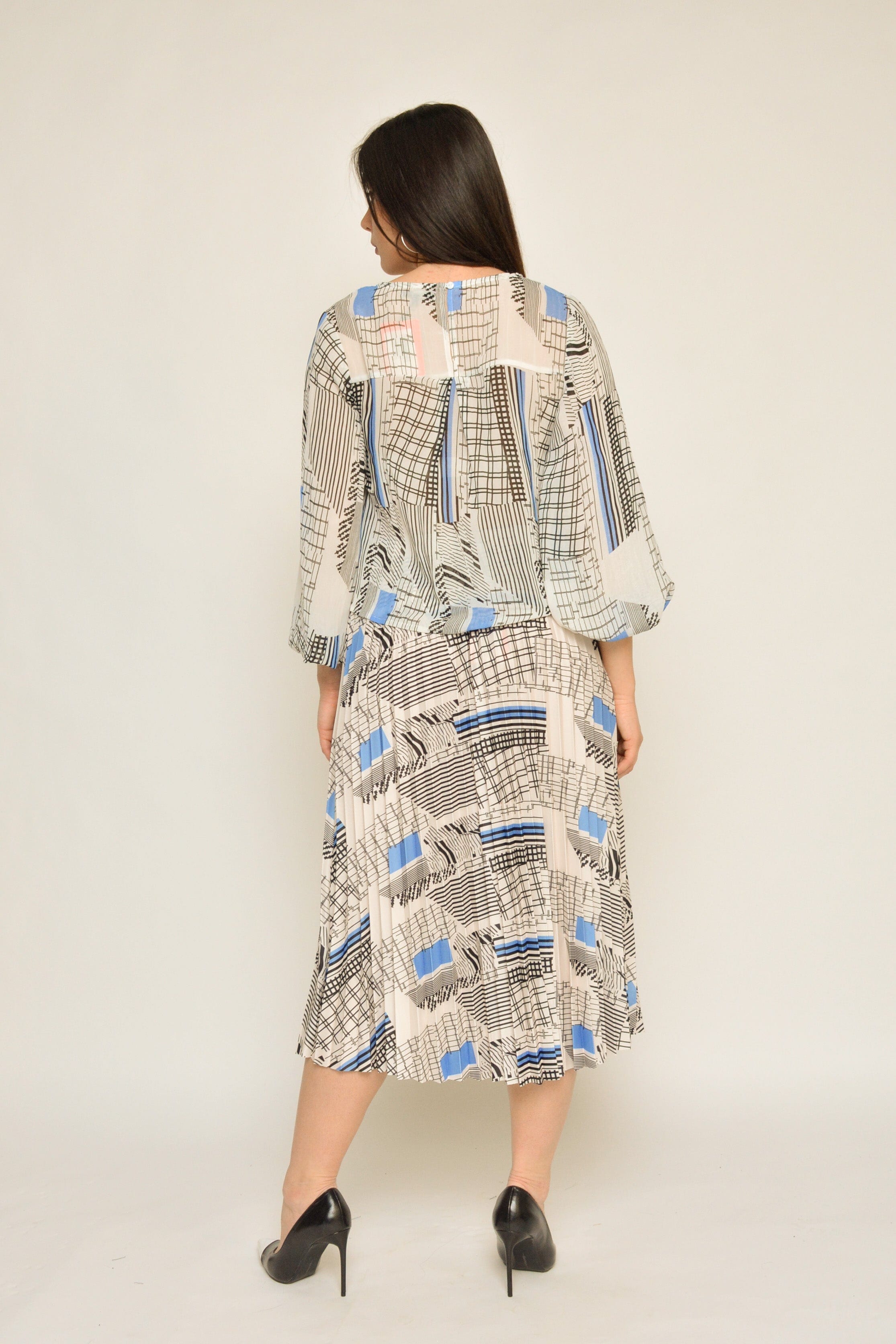 نتشي بلوزة منقوشة بكم طويل منفوخة نسائي