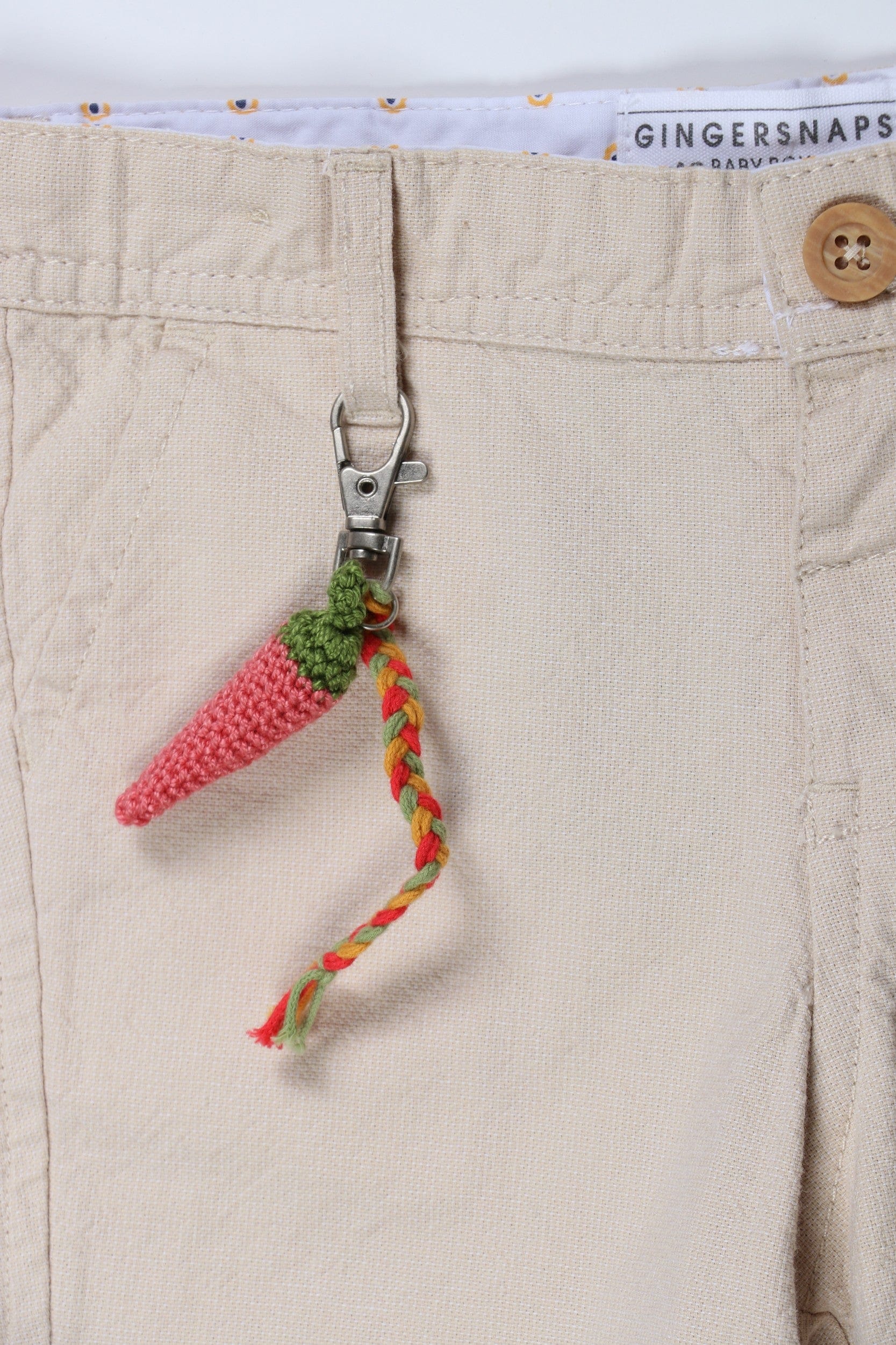 جينجرسنابس شورت أولادي خروج مزين بميدالية البيج