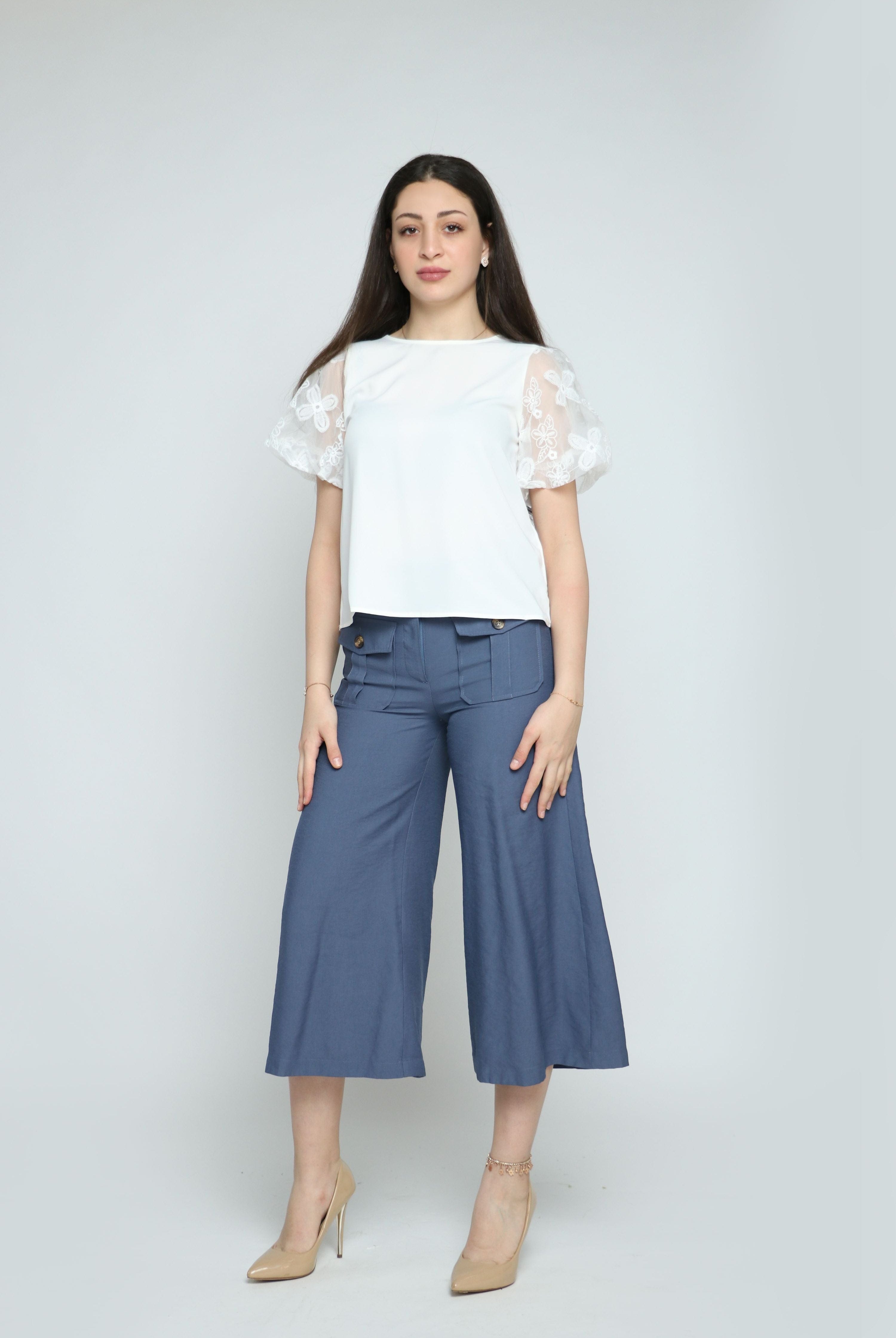 نتشي بنطلون بقصه واسعه من الأسفل ببجيوب