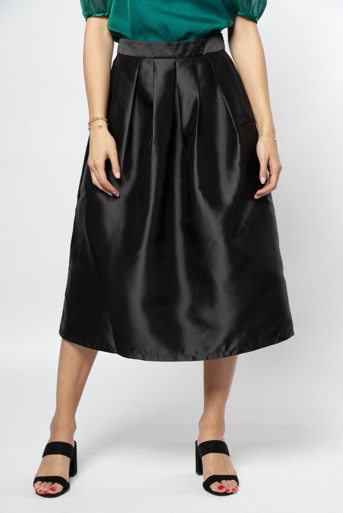 نتشي تنورة ميدي سهرة قماش لامع بكسرات