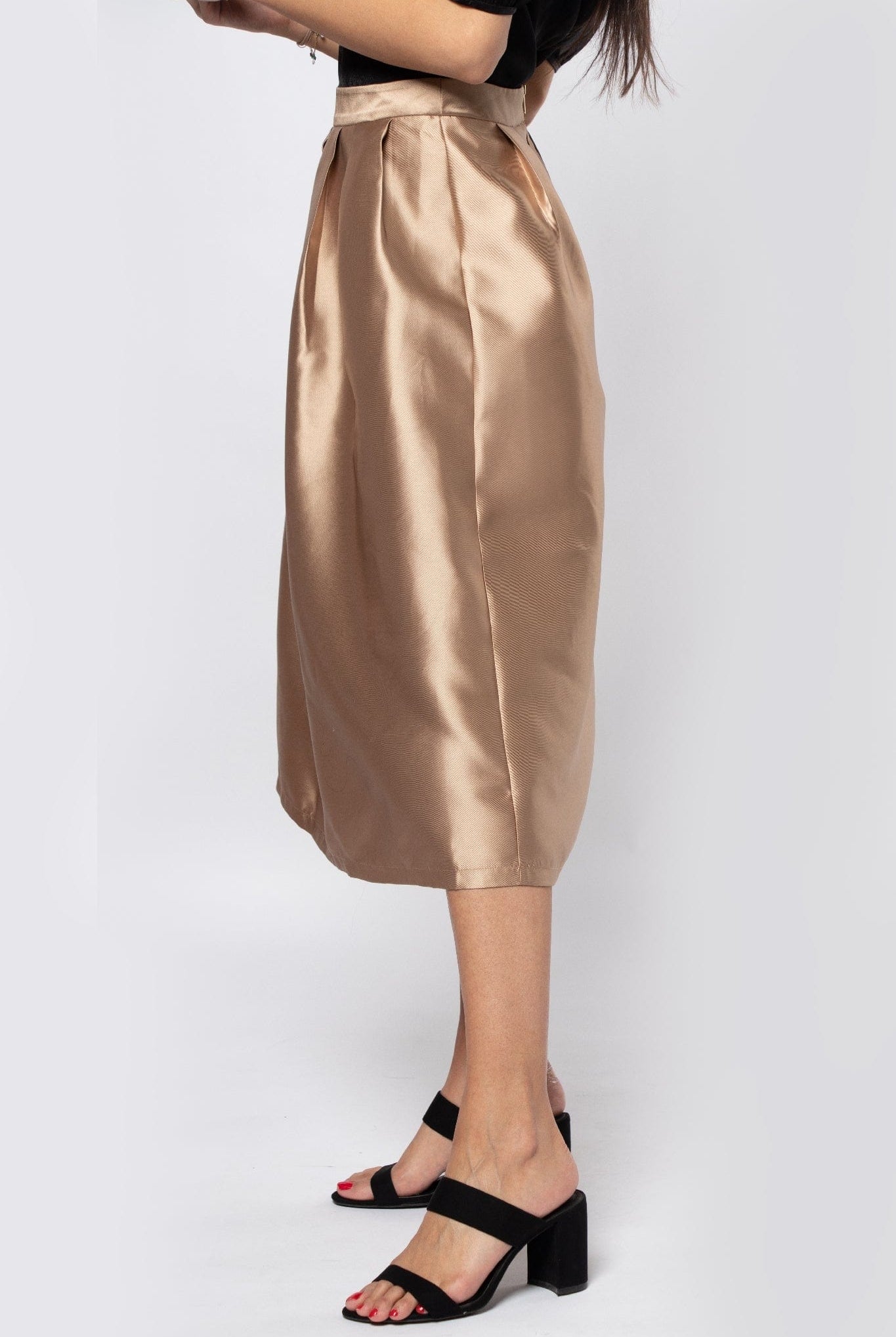 نتشي تنورة ميدي سهرة قماش لامع بكسرات