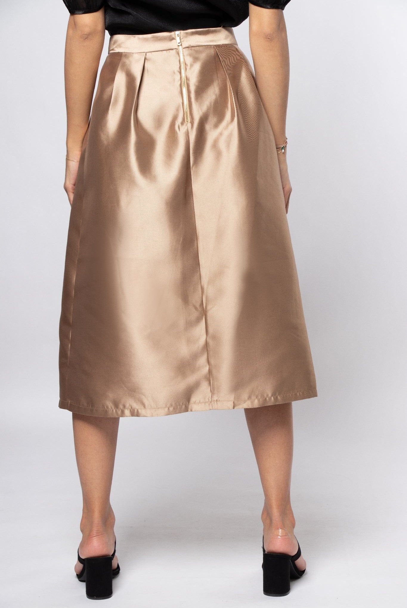 نتشي تنورة ميدي سهرة قماش لامع بكسرات