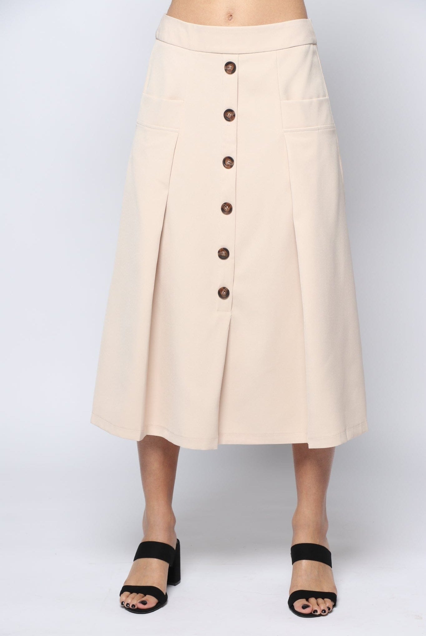 نتشي تنورة ميدي سادة واسعة بجيوب بازرار امامية