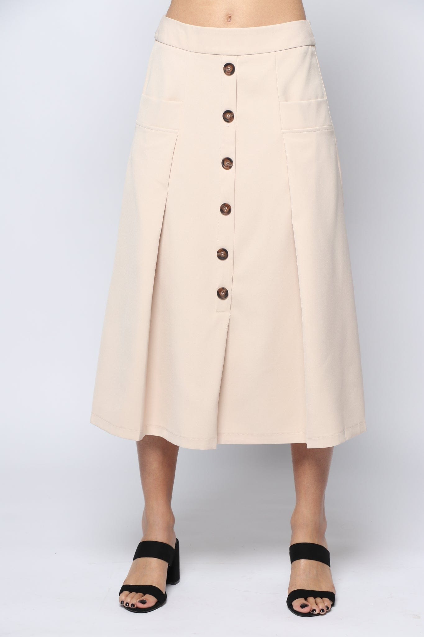 نتشي تنورة ميدي سادة واسعة بجيوب بازرار امامية