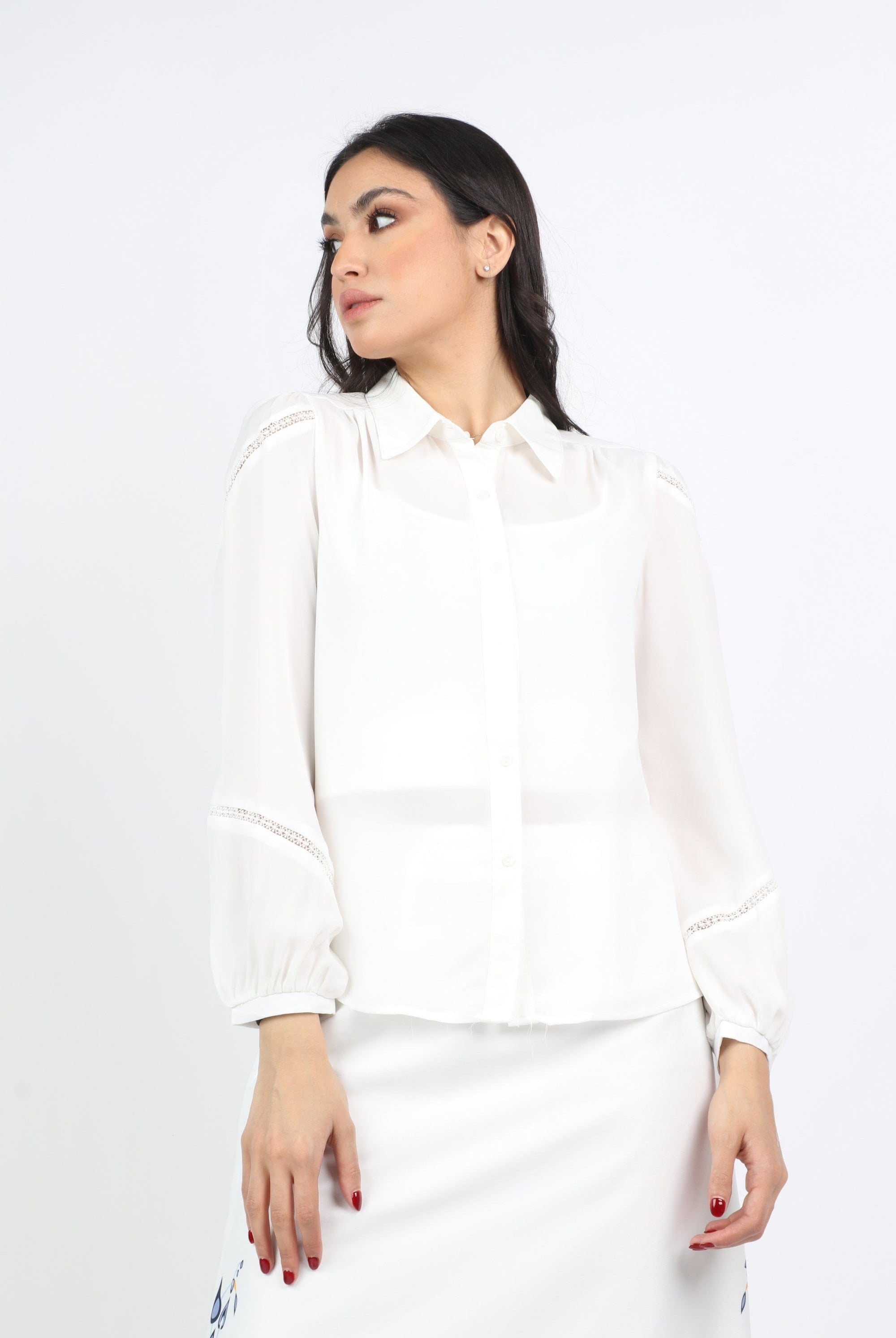 نتشي بلوزة سادة بياقة كم طويل نسائي