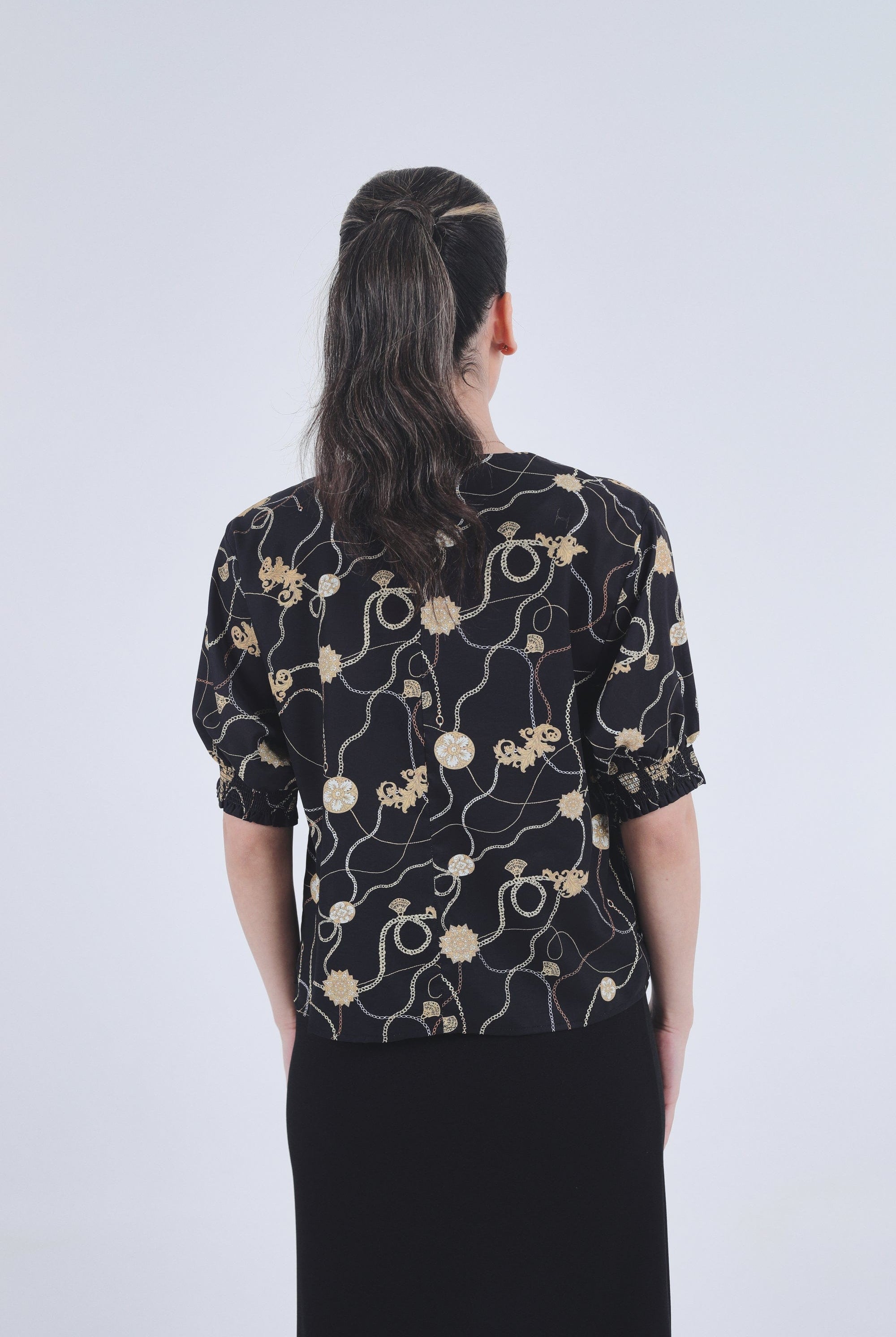 نتشي بلوزة منقوشة بكم قصير منفوخ نسائي