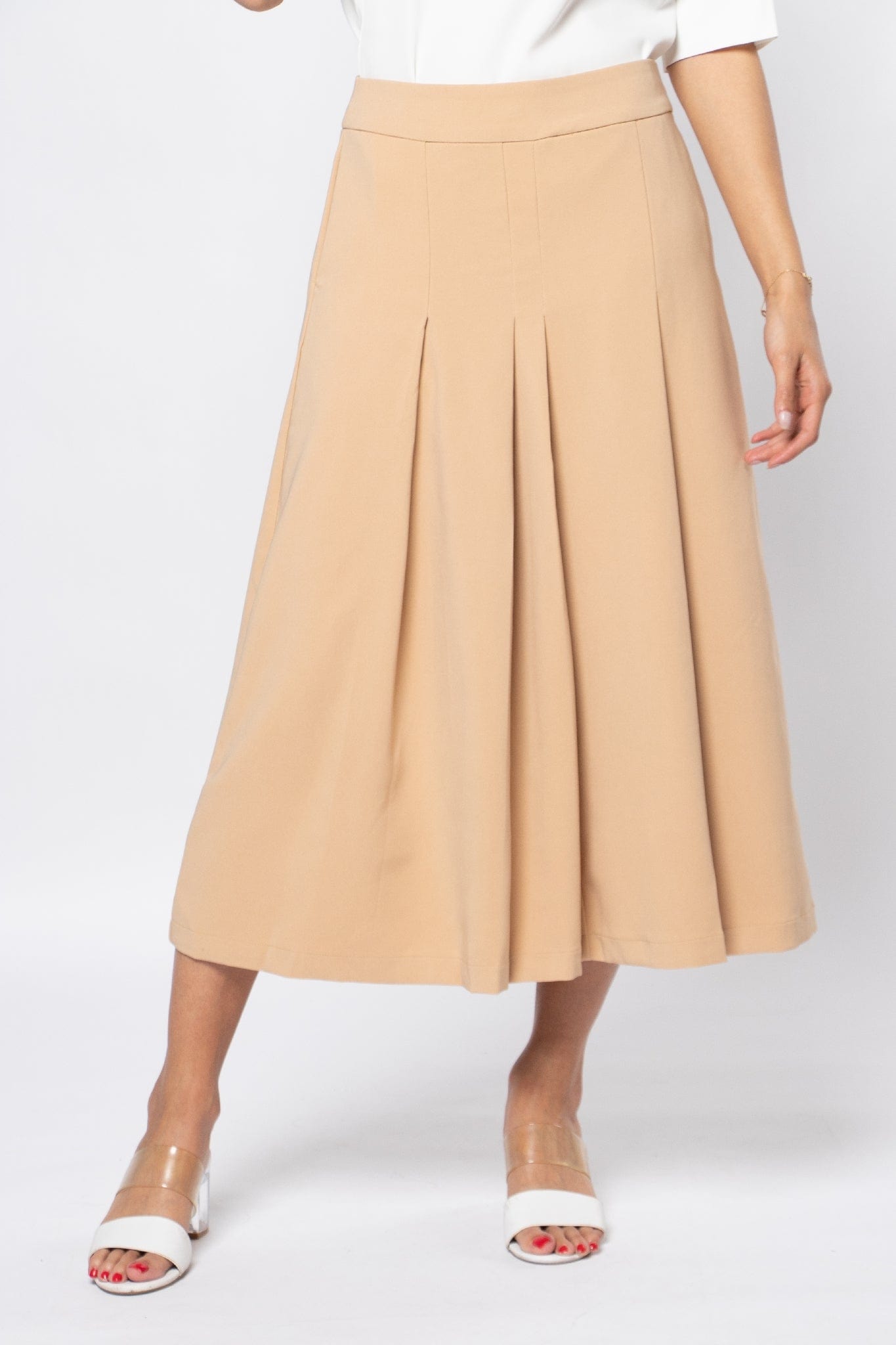 نتشي تنورة ميدي رسمية بكسرات سادة وحزام خصر