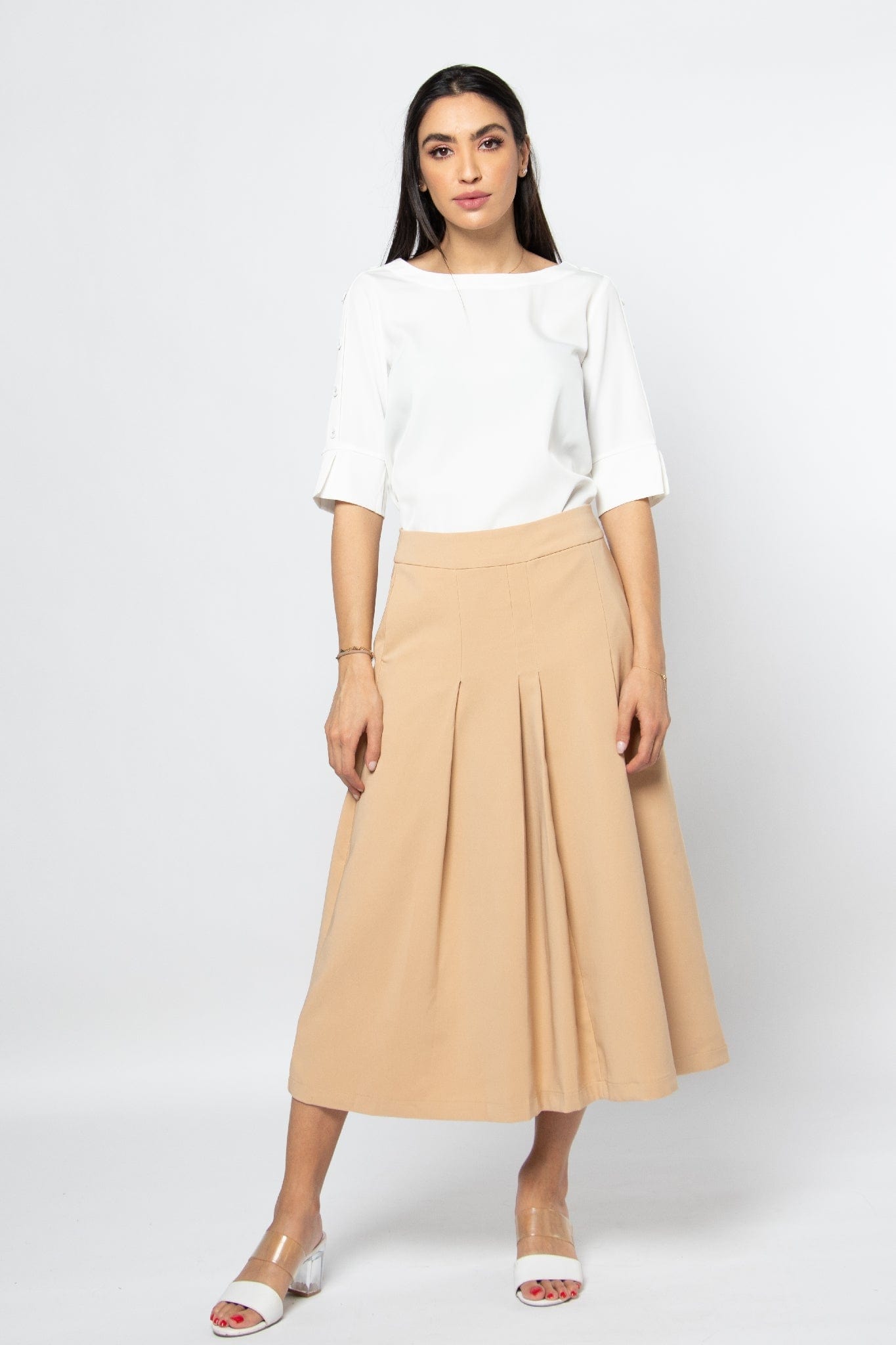 نتشي تنورة ميدي رسمية بكسرات سادة وحزام خصر