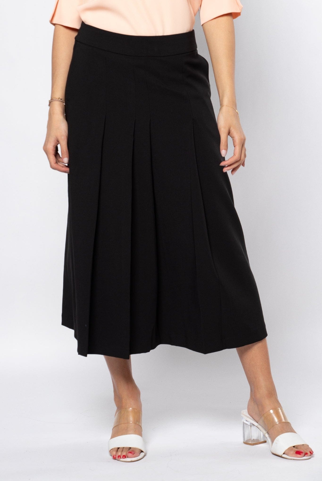 نتشي تنورة ميدي رسمية بكسرات سادة وحزام خصر