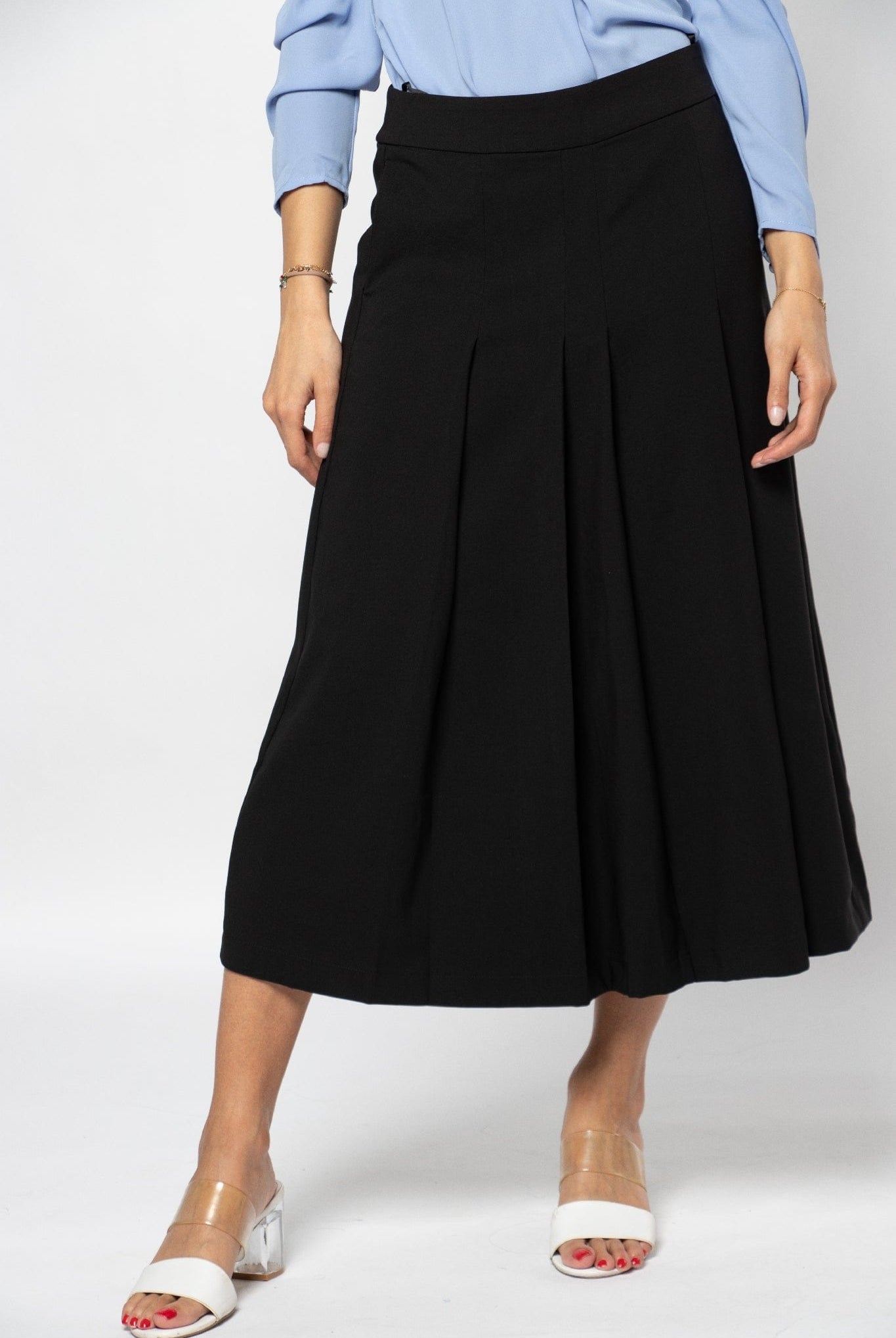 نتشي تنورة ميدي رسمية بكسرات سادة وحزام خصر