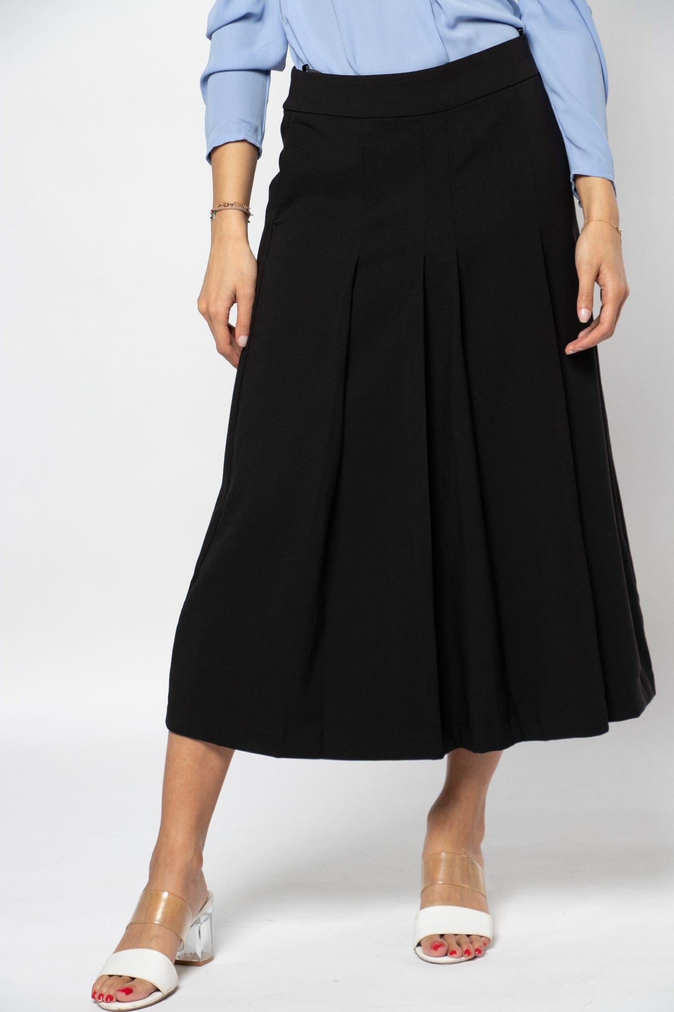 نتشي تنورة ميدي رسمية بكسرات سادة وحزام خصر