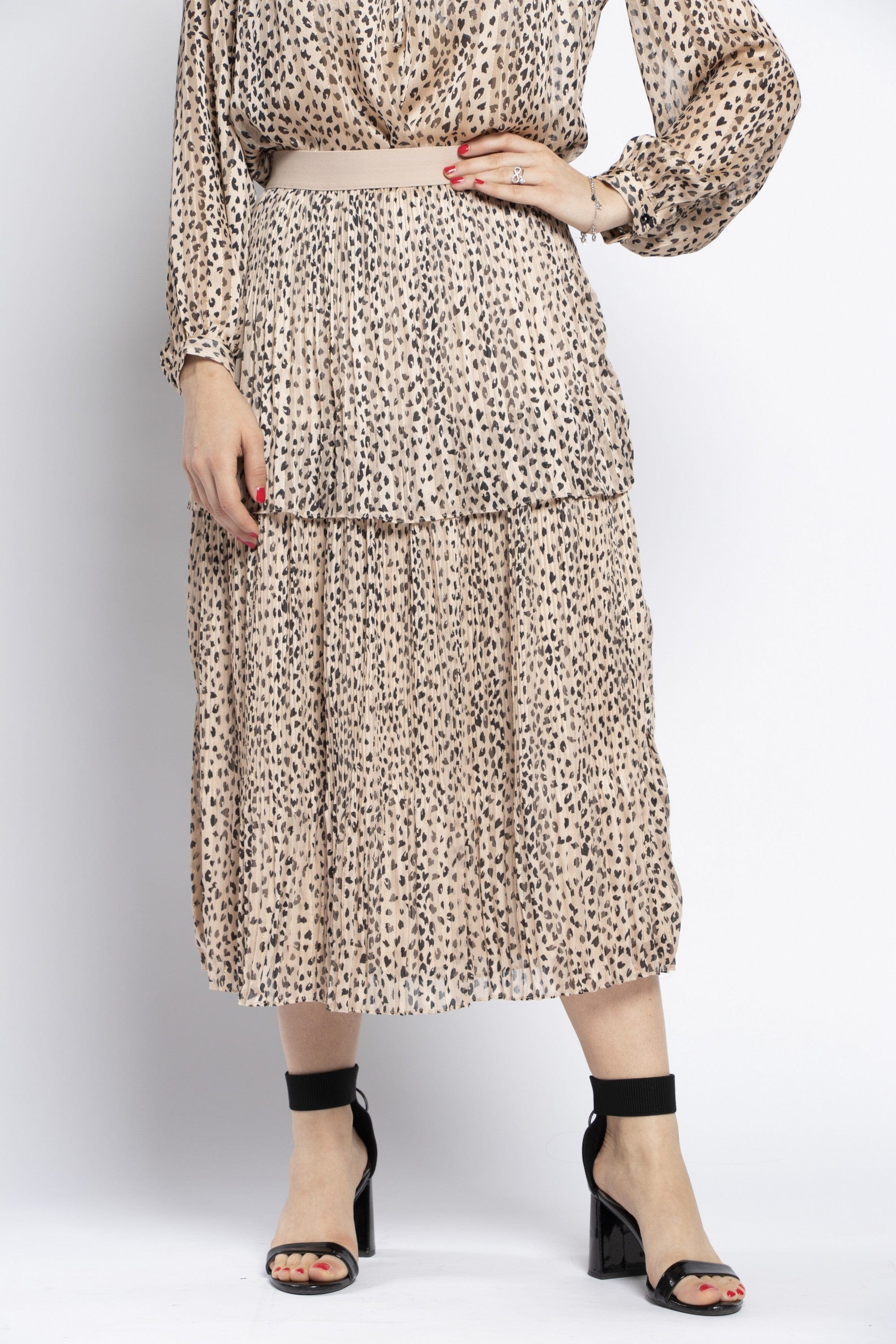 نتشي تنورة ميدي واسعه من طبقتين مطبوعة بنقشة جلد النمر