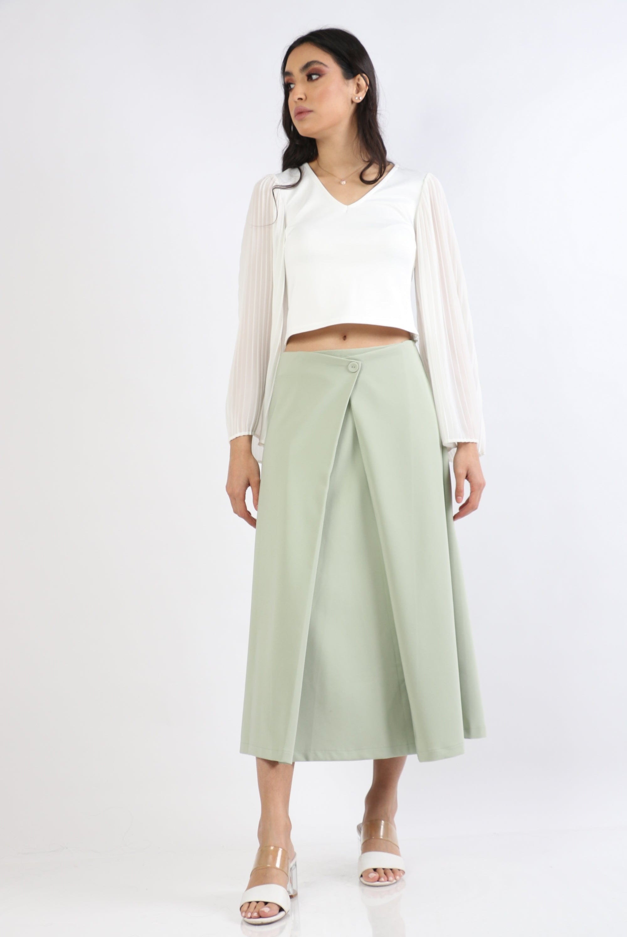 نتشي تنورة ميدي سادة بطيات عريضة محكمة بزرار