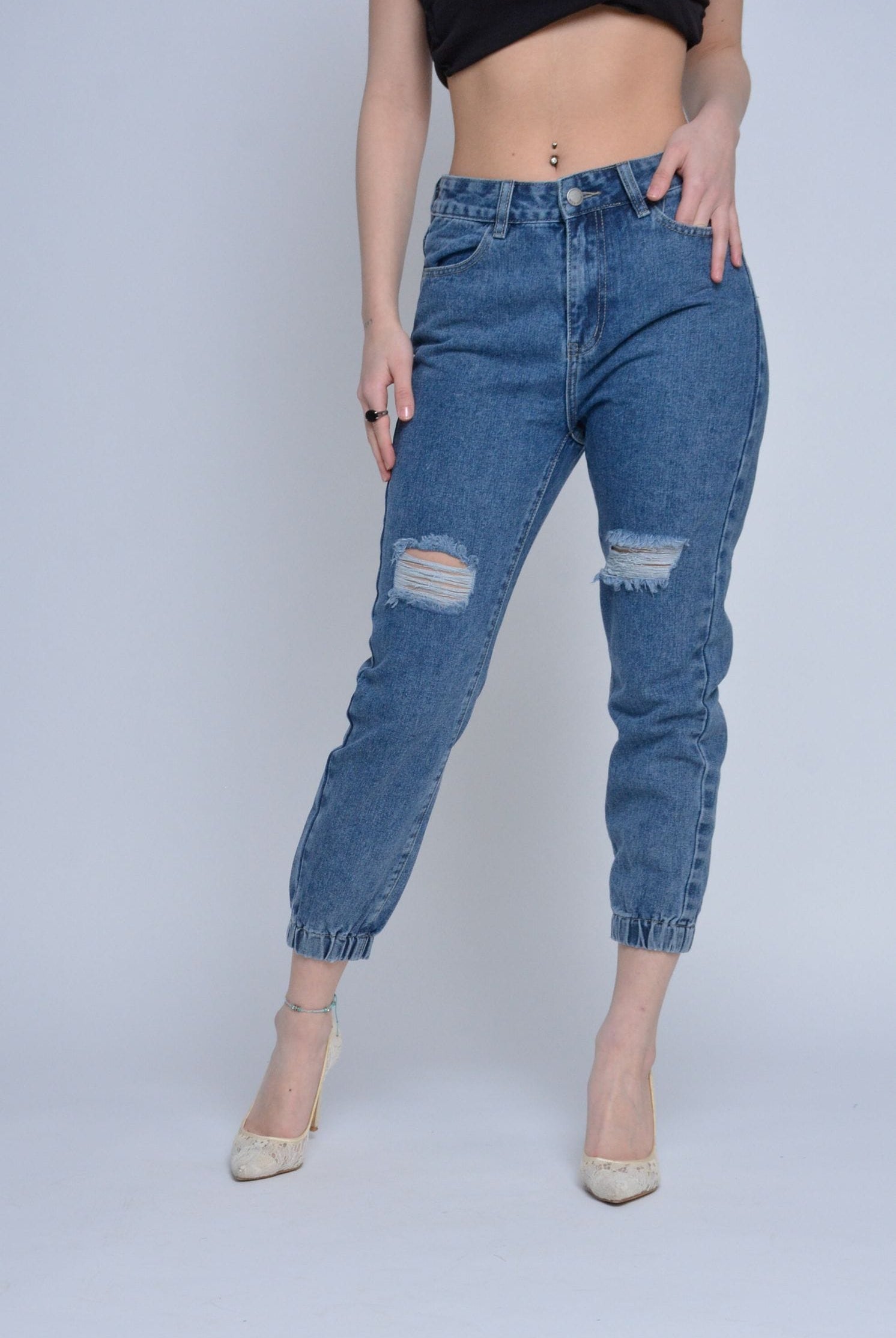 ميكا بنطلون جينز مقطع من الأمام بأساور نسائي