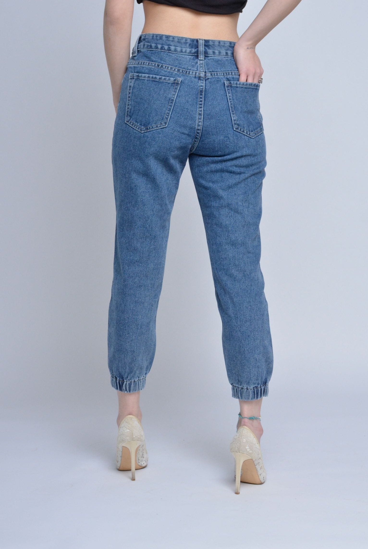 ميكا بنطلون جينز مقطع من الأمام بأساور نسائي