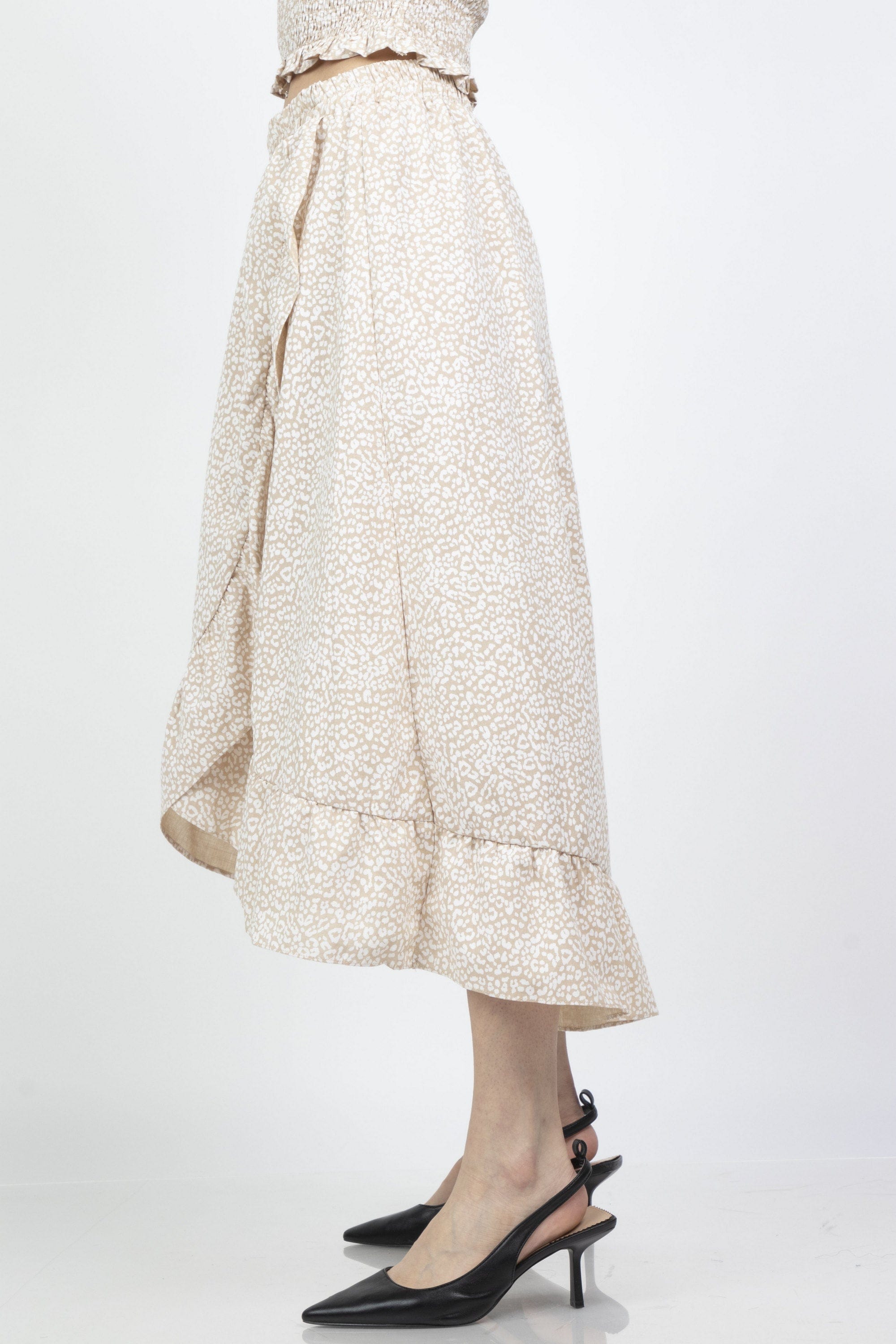 ميكا تنورة ميدي ملفوفة منقوشة بكشكش من الأطراف