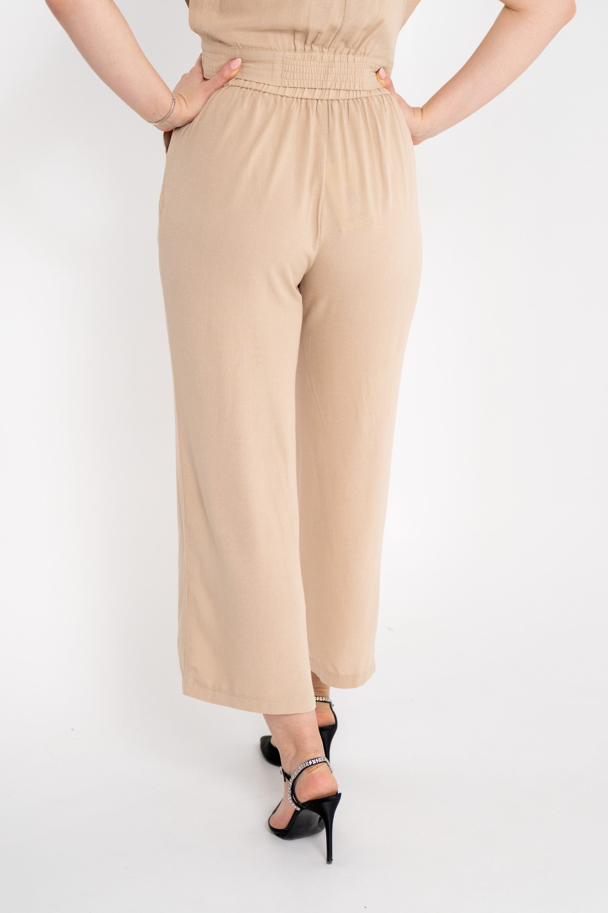 ميكا بنطلون سادة واسع بجيوب جانبية نسائي