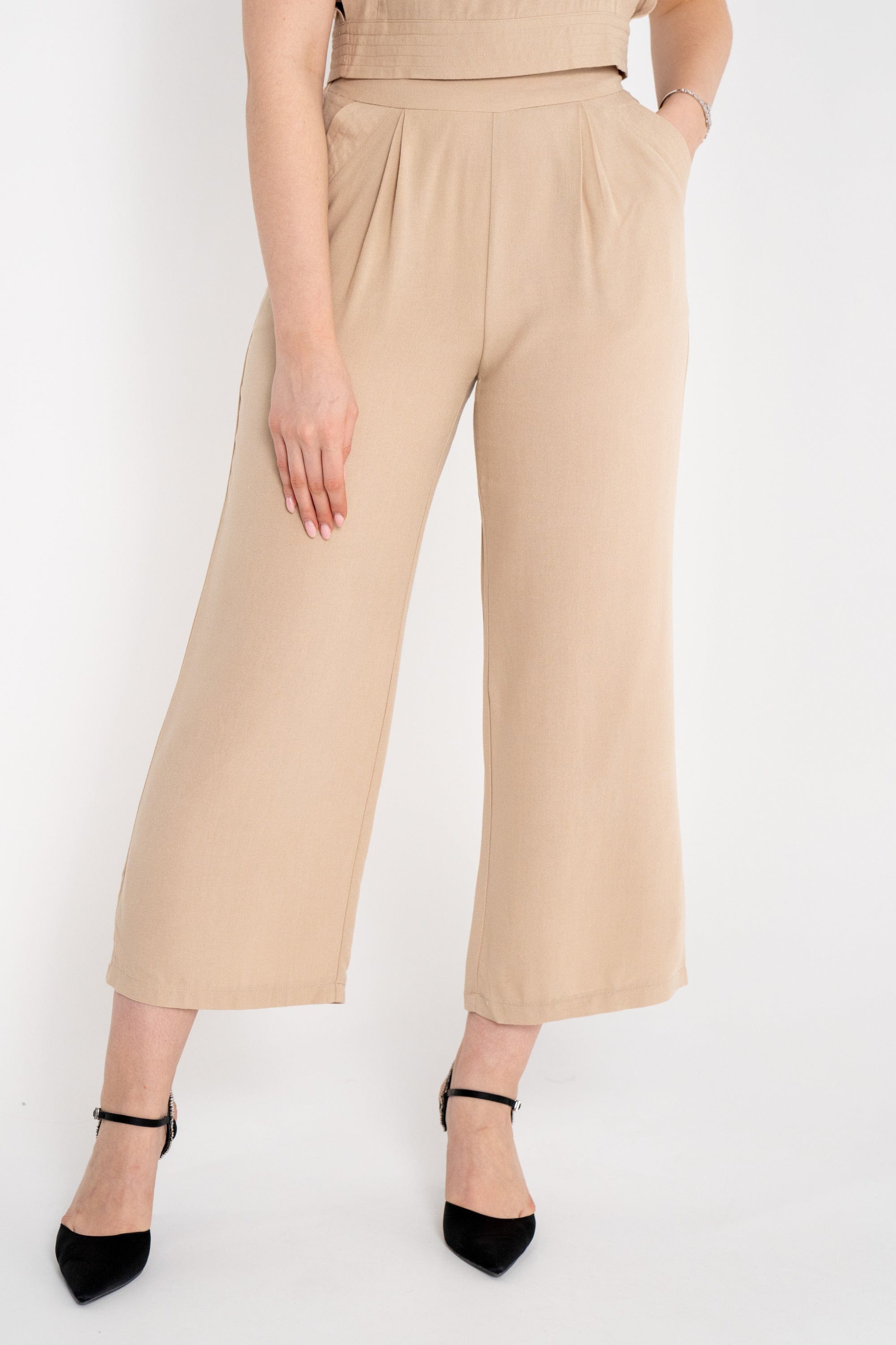 ميكا بنطلون سادة واسع بجيوب جانبية نسائي